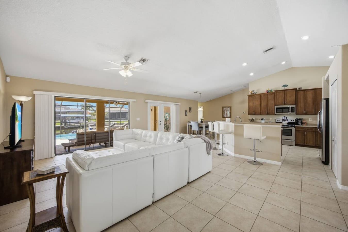 Open concept living room seamlessly connected to the kitchen and dining area.