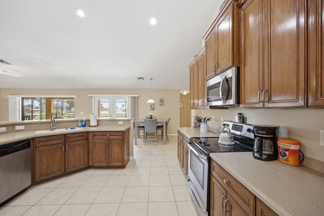 Well-appointed kitchen with abundant cabinet storage and an open layout.