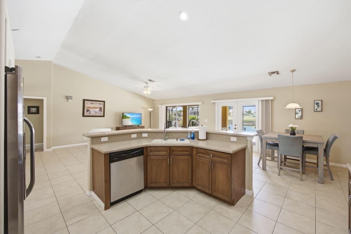 Expansive kitchen with wraparound counters, plenty of workspace, and open sightlines.