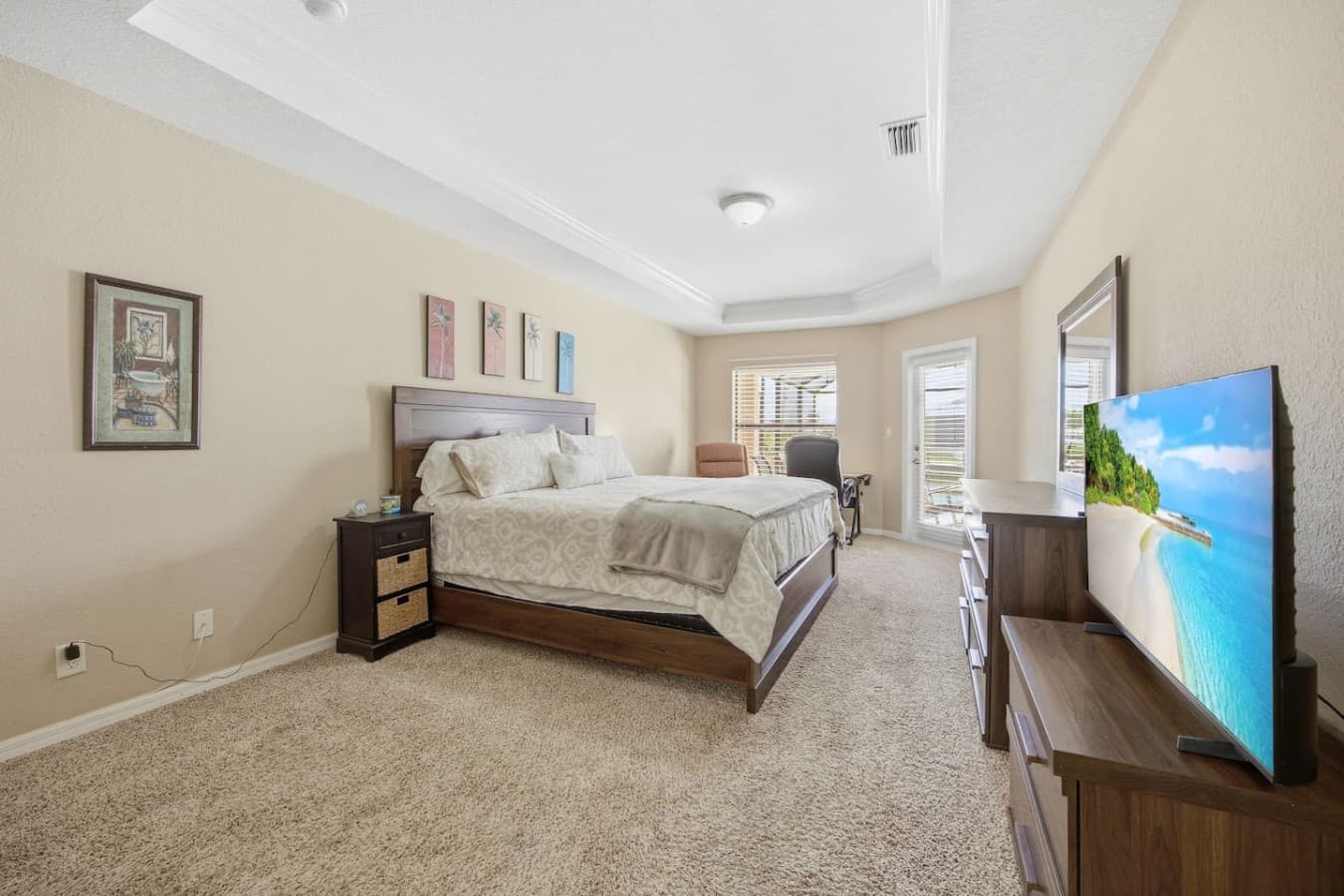 Inviting primary bedroom with generous space, natural light, and a relaxing atmosphere.