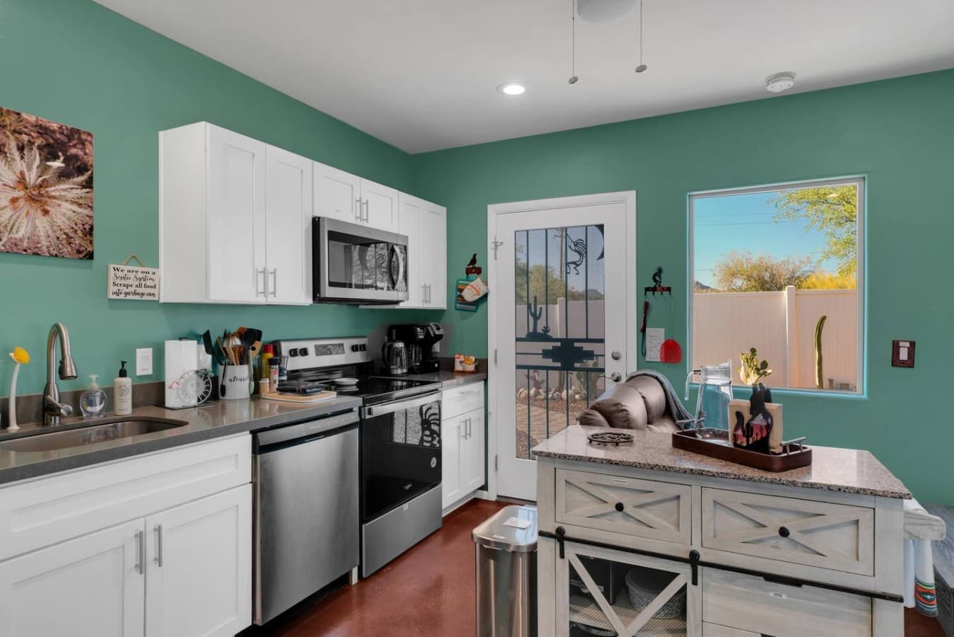 Fully stocked kitchen with modern appliances and everything needed for your stay.