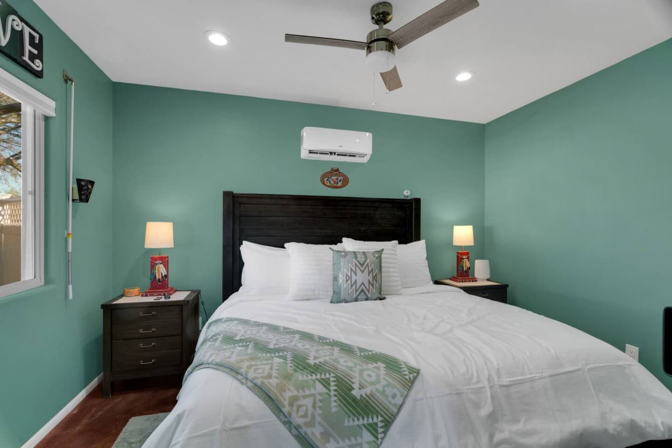 Cozy queen bed designed for a restful night’s sleep.