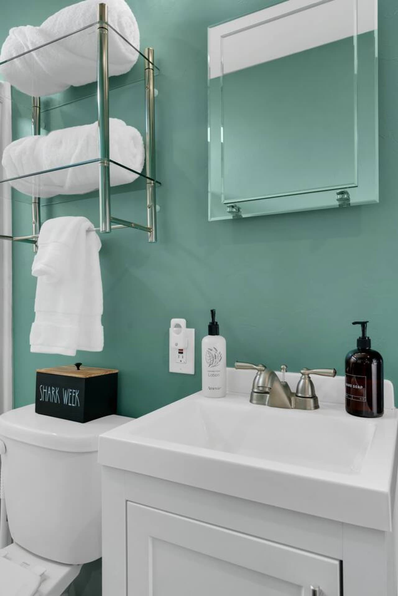 Clean and modern vanity stocked with essentials for your stay.