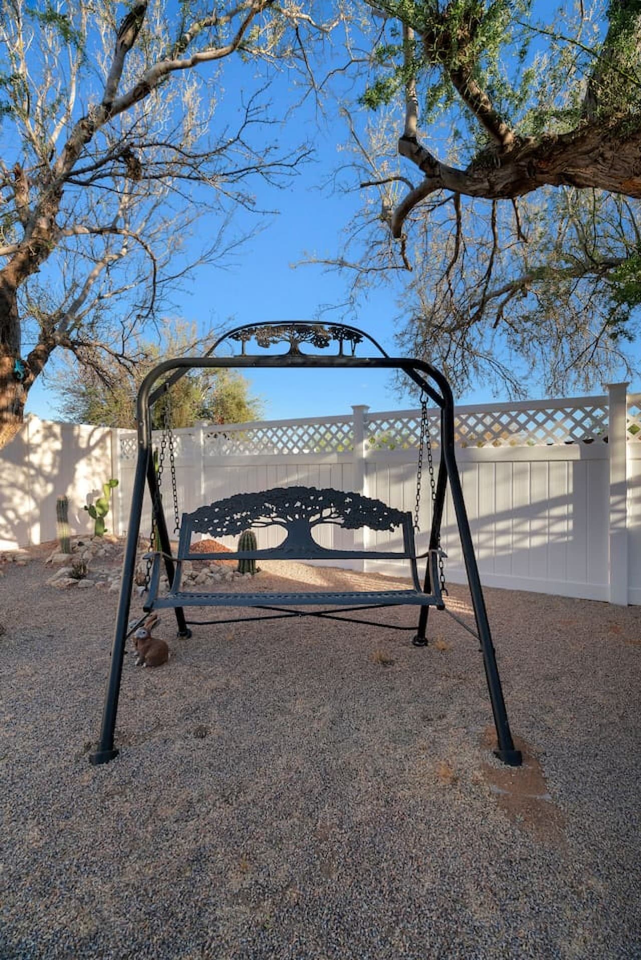 Relax on the outdoor swing and enjoy the quiet desert atmosphere.