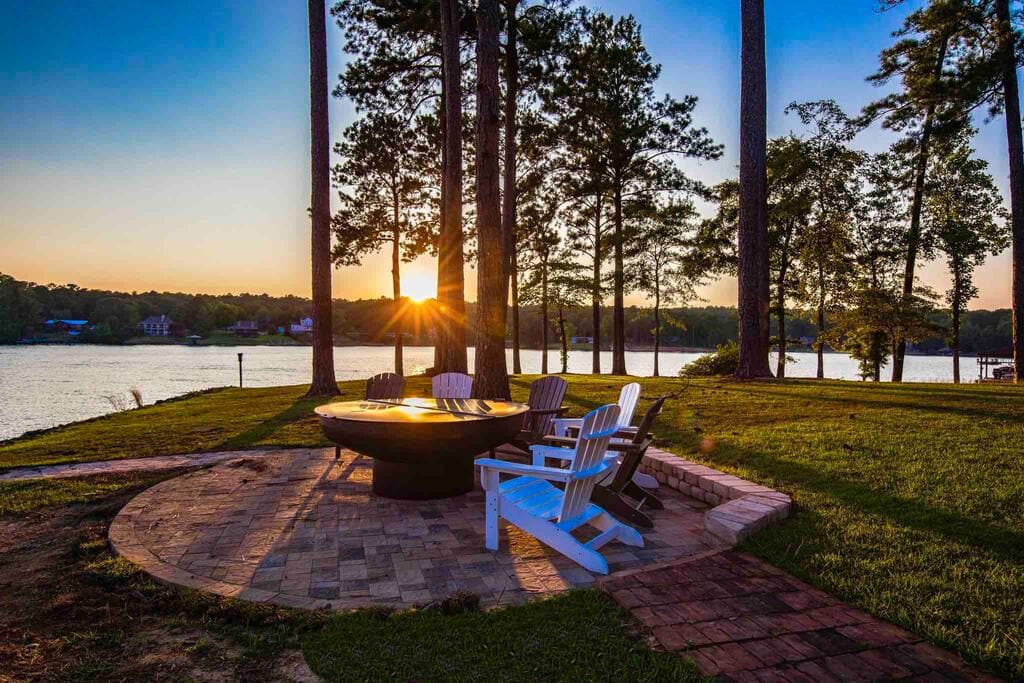 Outside fire pit with chair and sitting wall