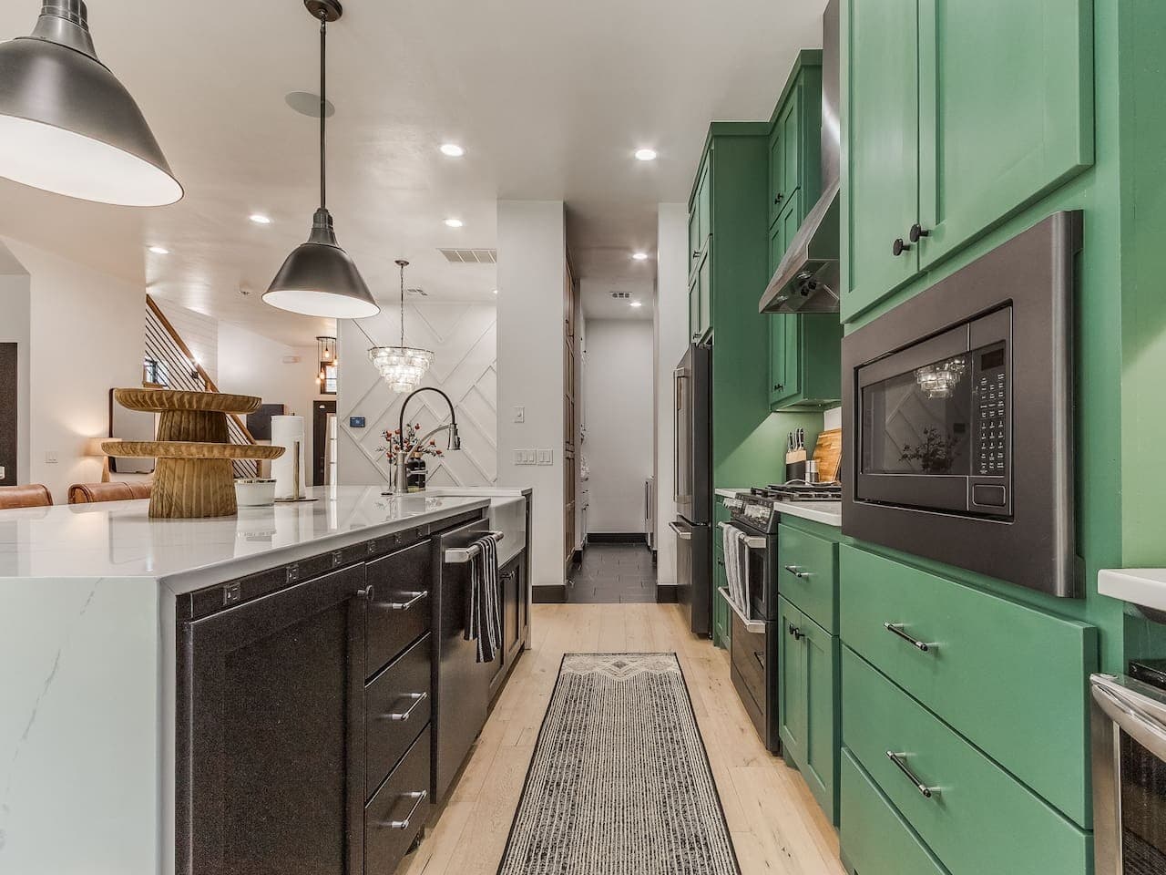 Additional counter space and cabinetry provide plenty of room for preparing meals and keeping everything organized.
