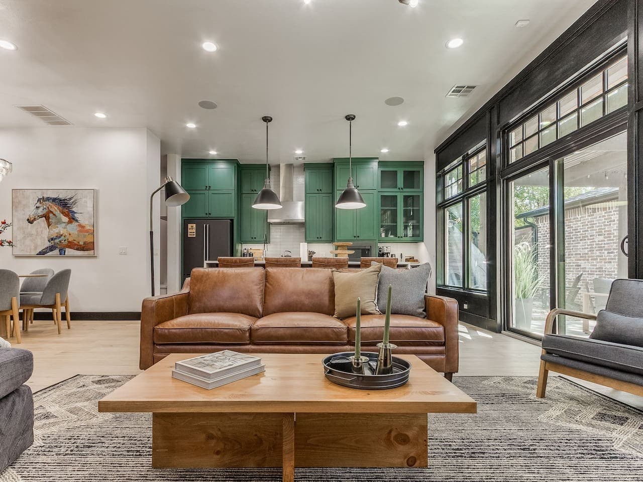 Comfortable leather seating and a spacious coffee table create the perfect setting for conversation and relaxing together.