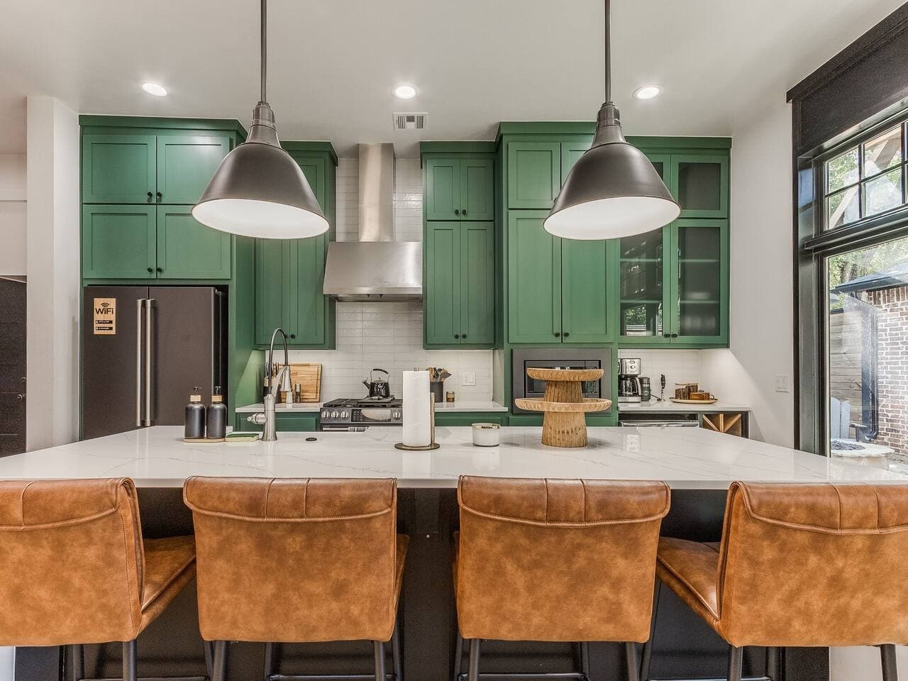 Pull up a seat at the kitchen island for casual meals, morning coffee, or conversation while cooking.