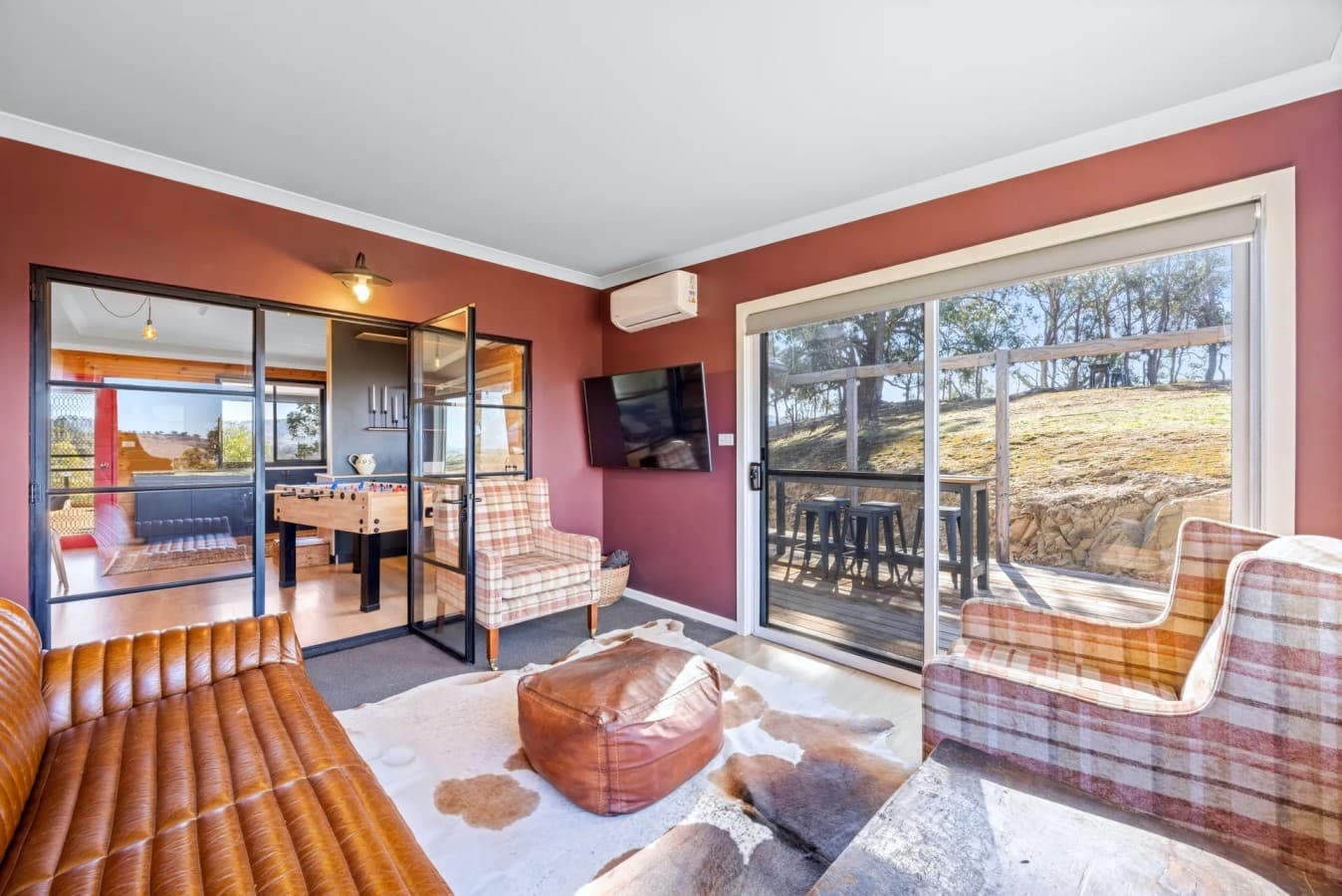 07 Bella Vista High Country Retreat - Lounge Room and Deck Access.jpg