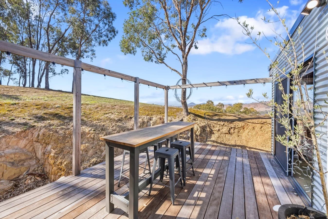 16 Bella Vista High Country Retreat - Outdoor Deck and Bar Table.jpg