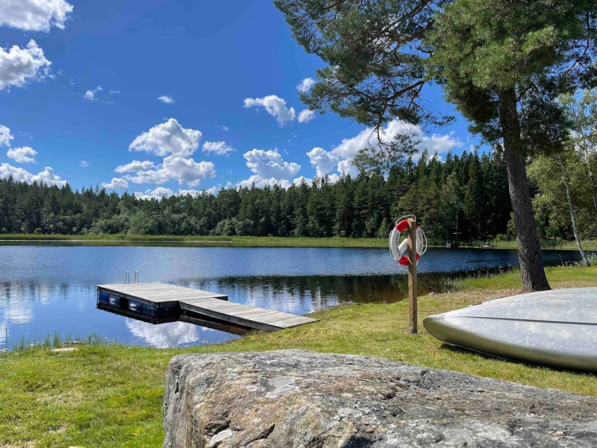 Private dock at lake Trehörningen on the property. All canoes, kayaks, SUPs are included in price.