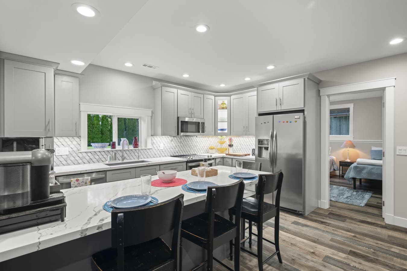 Open kitchen with a large island and comfortable seating for casual meals_.jpg
