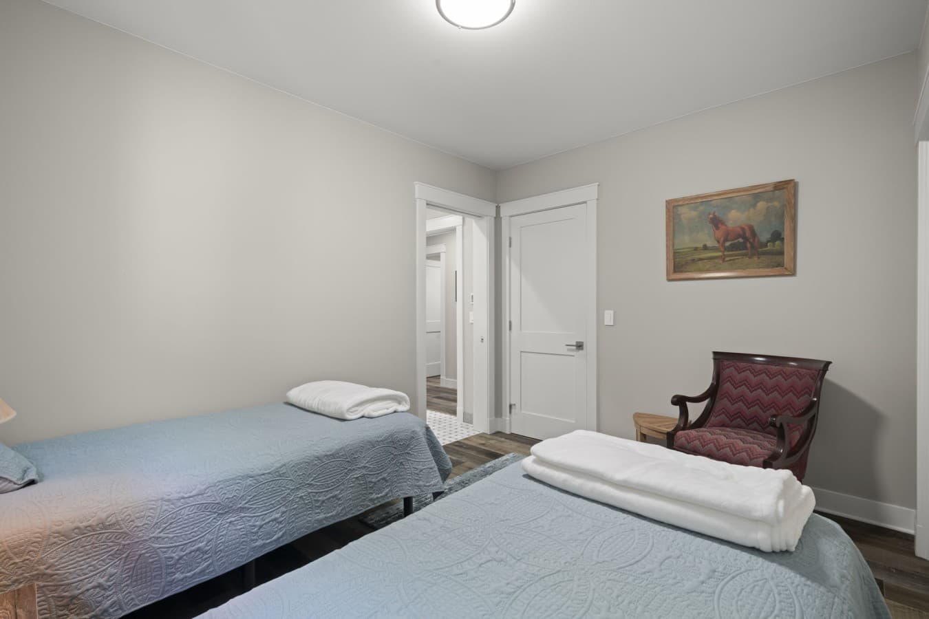 Bright second bedroom with two twin-size beds—ideal for children, friends, or additional guests_.jpg