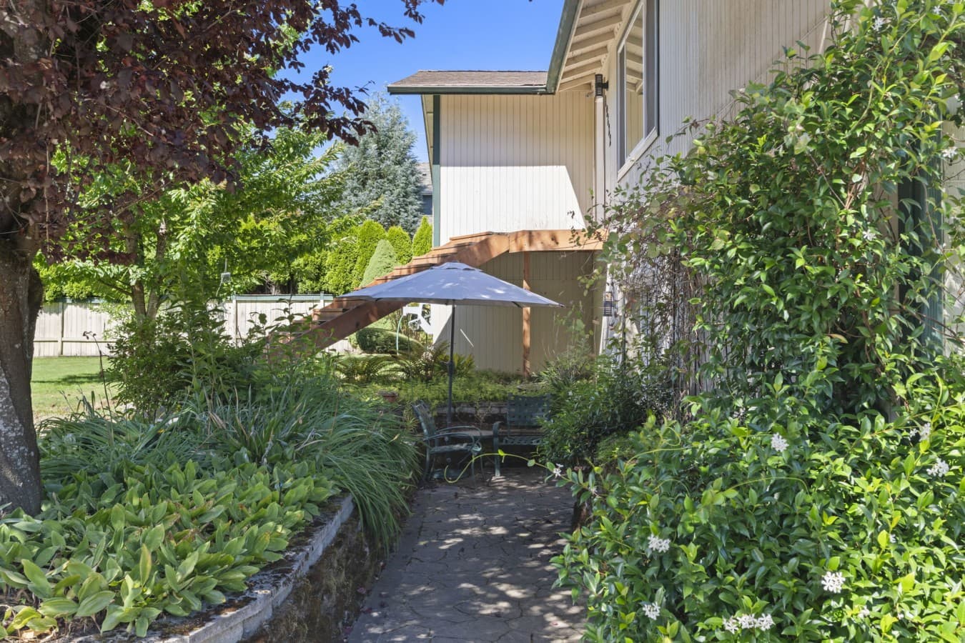 Garden pathway leading to the private entrance and outdoor seating area_.jpg