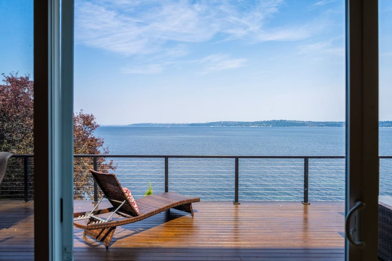 Your waterfront retreat, where lush surroundings meet the sea.