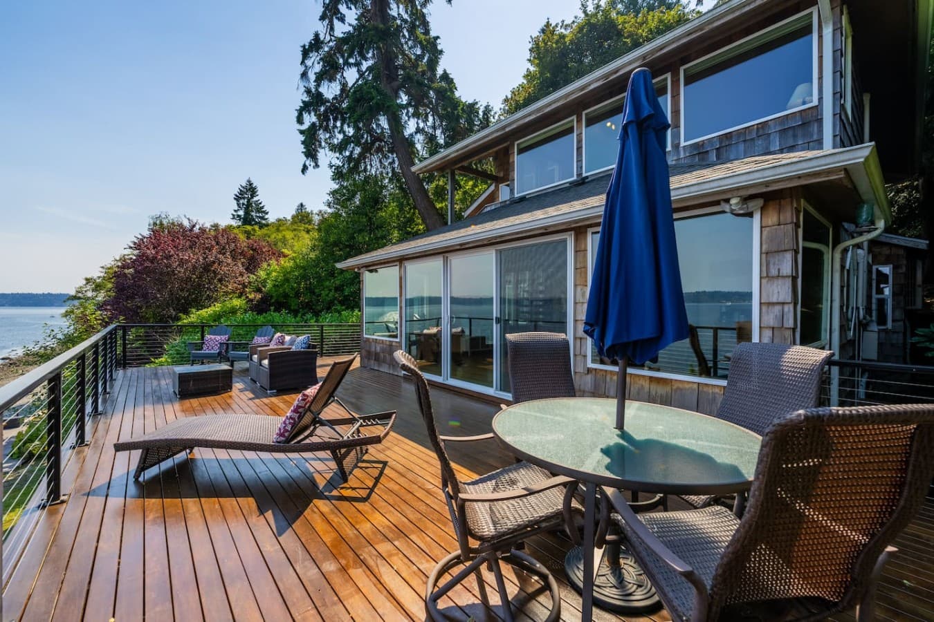 Expansive waterfront deck with uninterrupted views across the water.