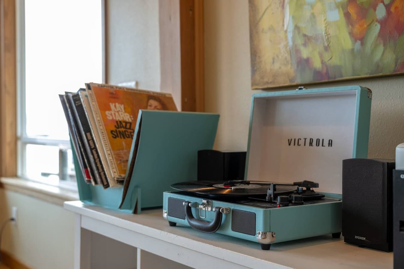 Cozy evenings at Sea and Sky start with a crackling fire, a favorite record, and waterfront views.