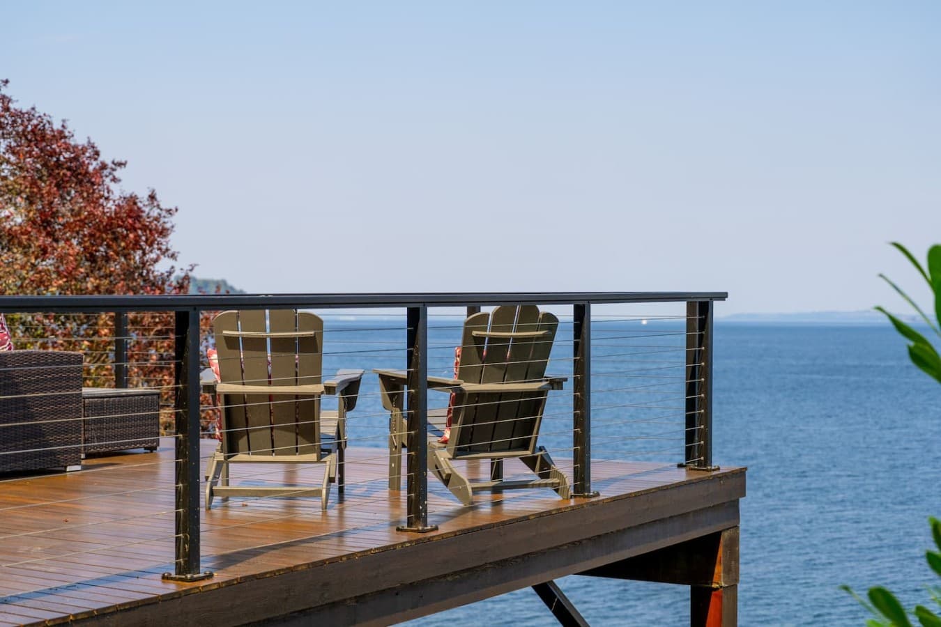 Settle into the Adirondack chairs and take in endless blue-water views from your private waterfront deck.