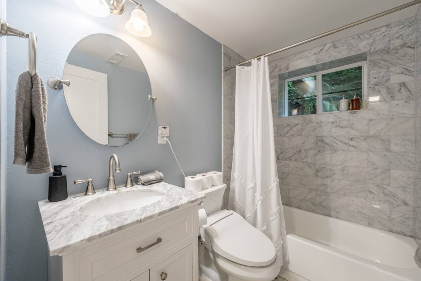 A bright, polished bathroom designed for easy mornings and relaxing evenings.