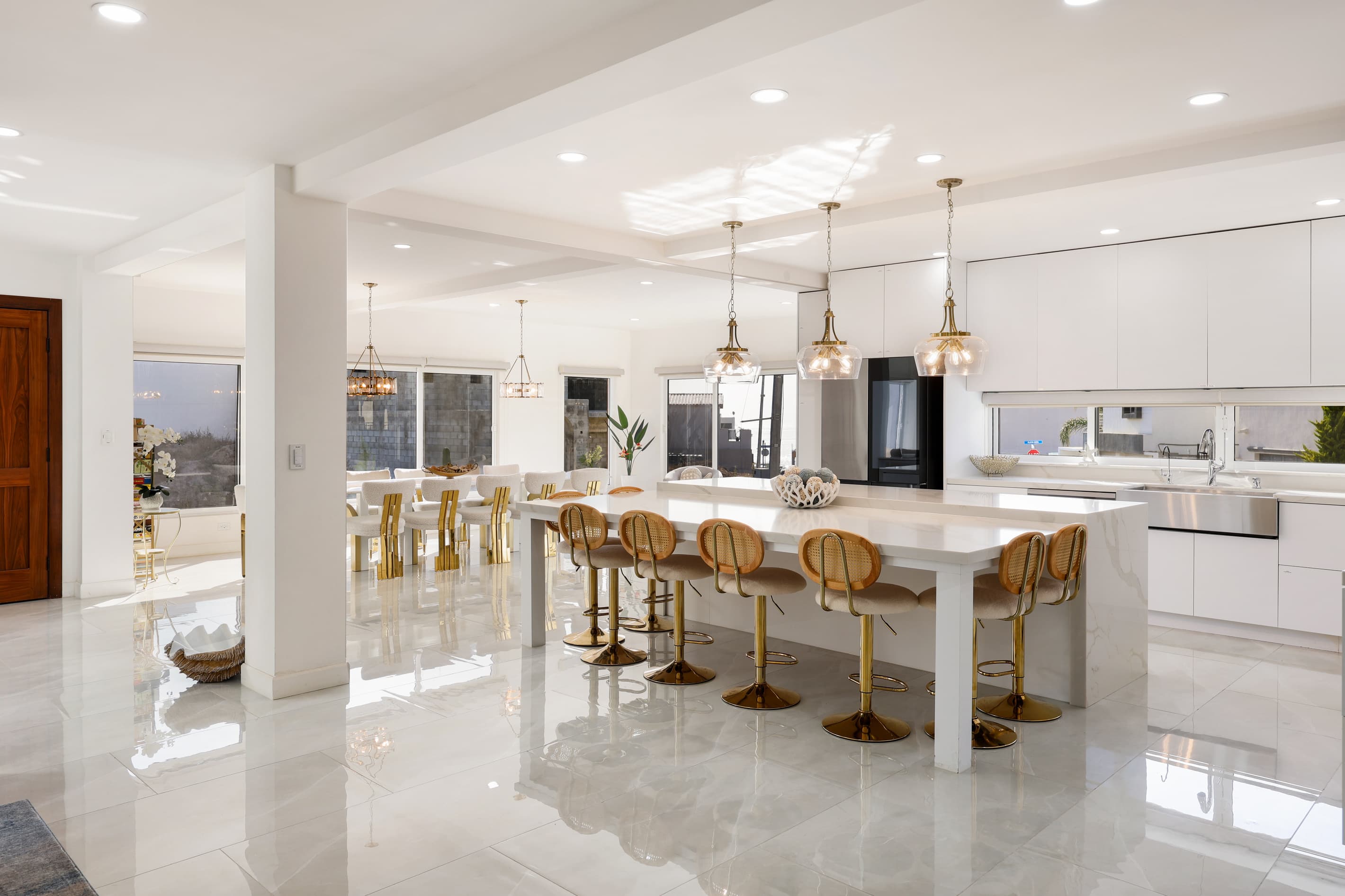 Open-concept dining and kitchen area designed for meals and time together