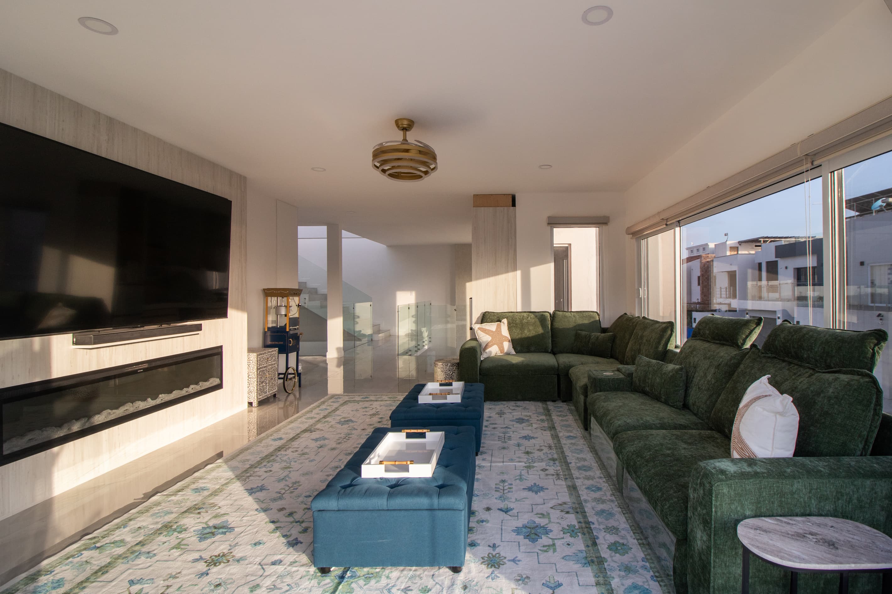 Movie room with massive 98-inch Smart TV, perfect for movie nights and big games