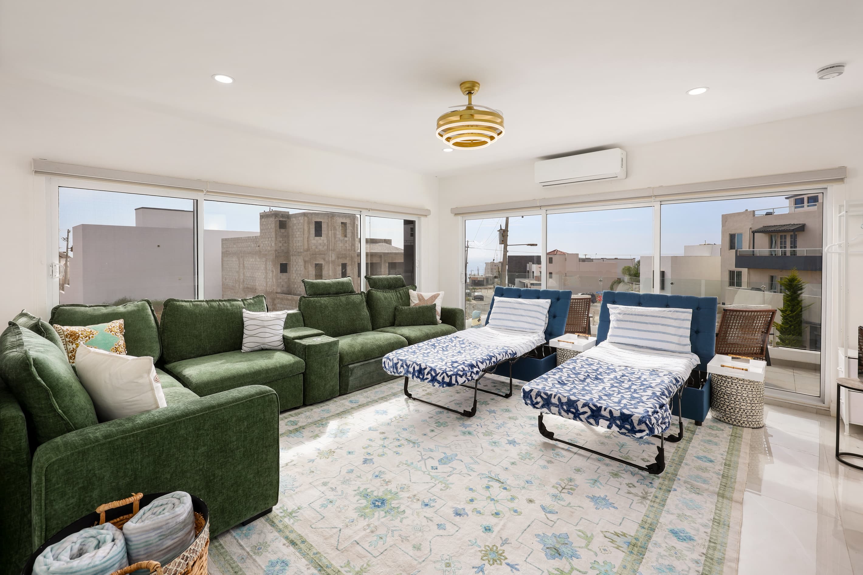 Spacious movie room with comfortable seating and plenty of room for the whole group