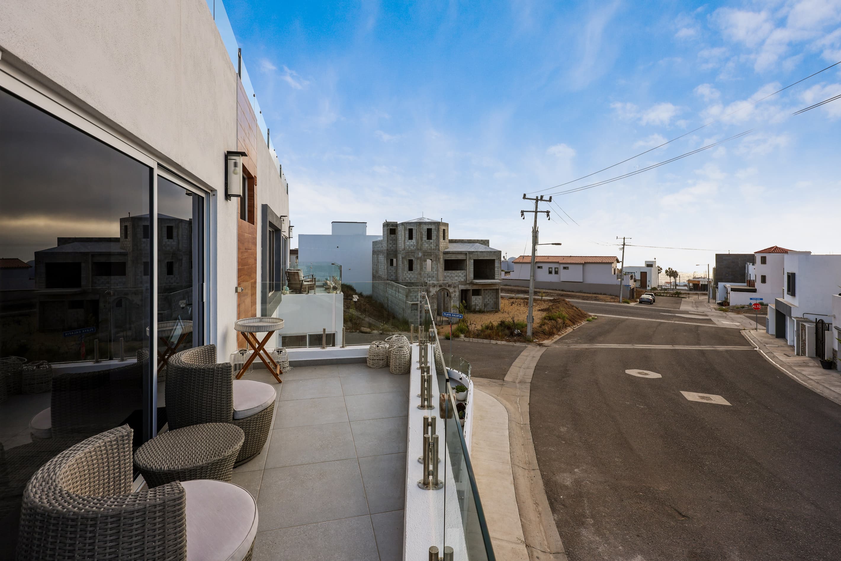 Step onto the primary suite’s private balcony for fresh ocean air