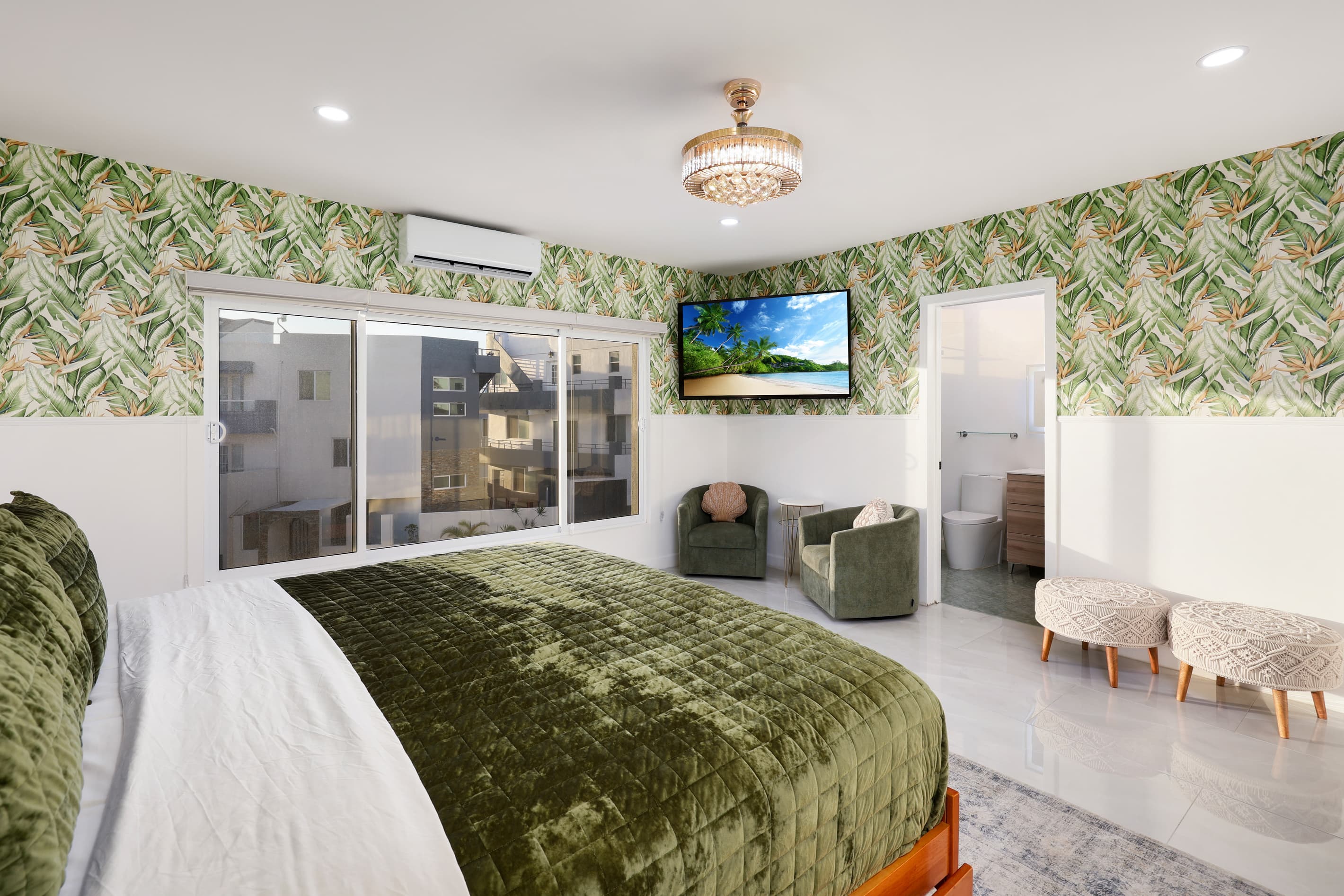 King bedroom on the second floor with ensuite bathroom & Smart TV