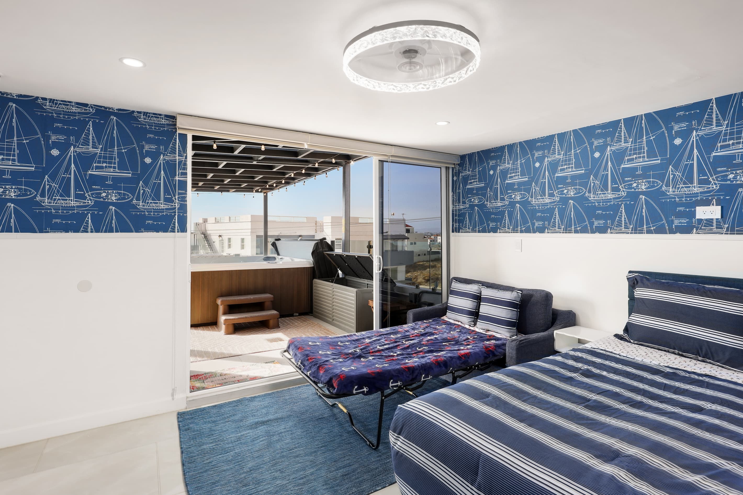 Step directly from the third-floor bedroom onto the rooftop terrace & hot tub