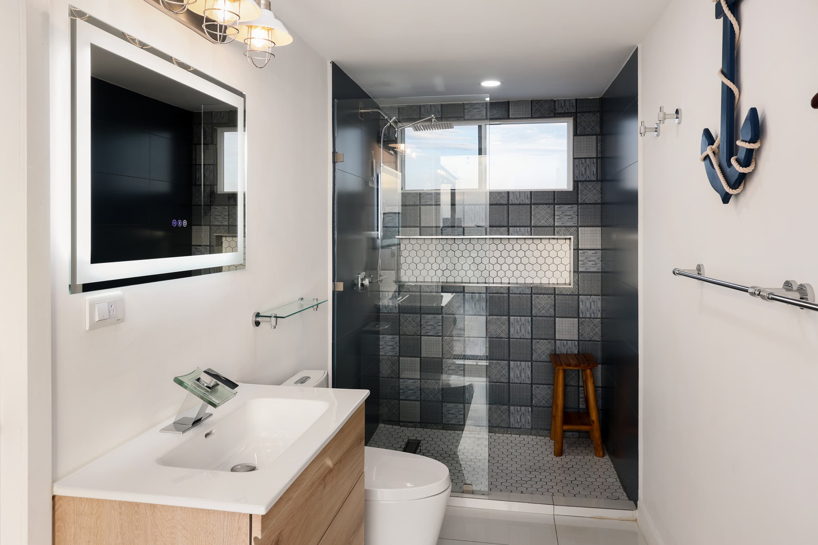 Private ensuite bathroom for the third-floor bedroom with walk-in shower