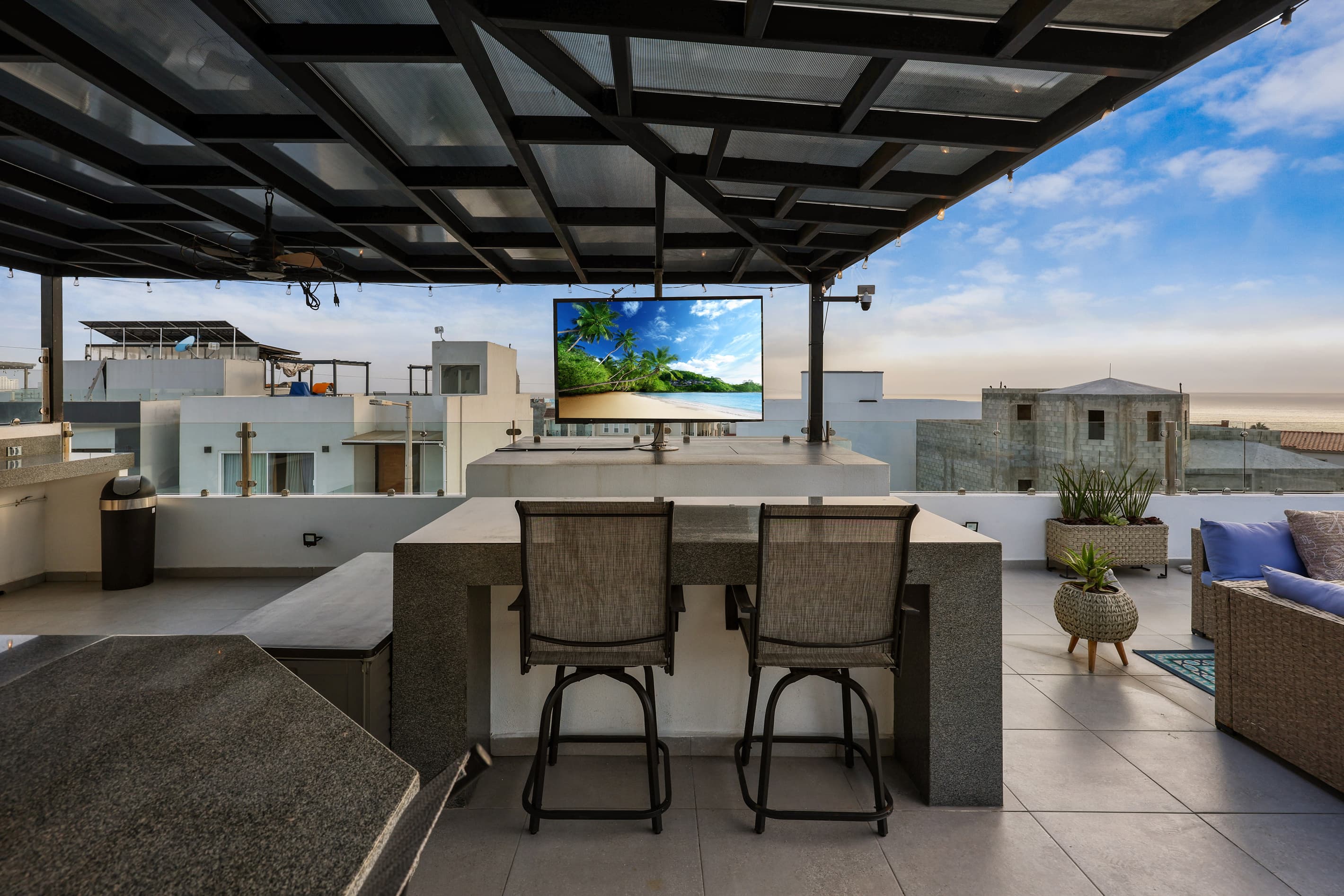Plenty of counter space and seating options on the rooftop deck