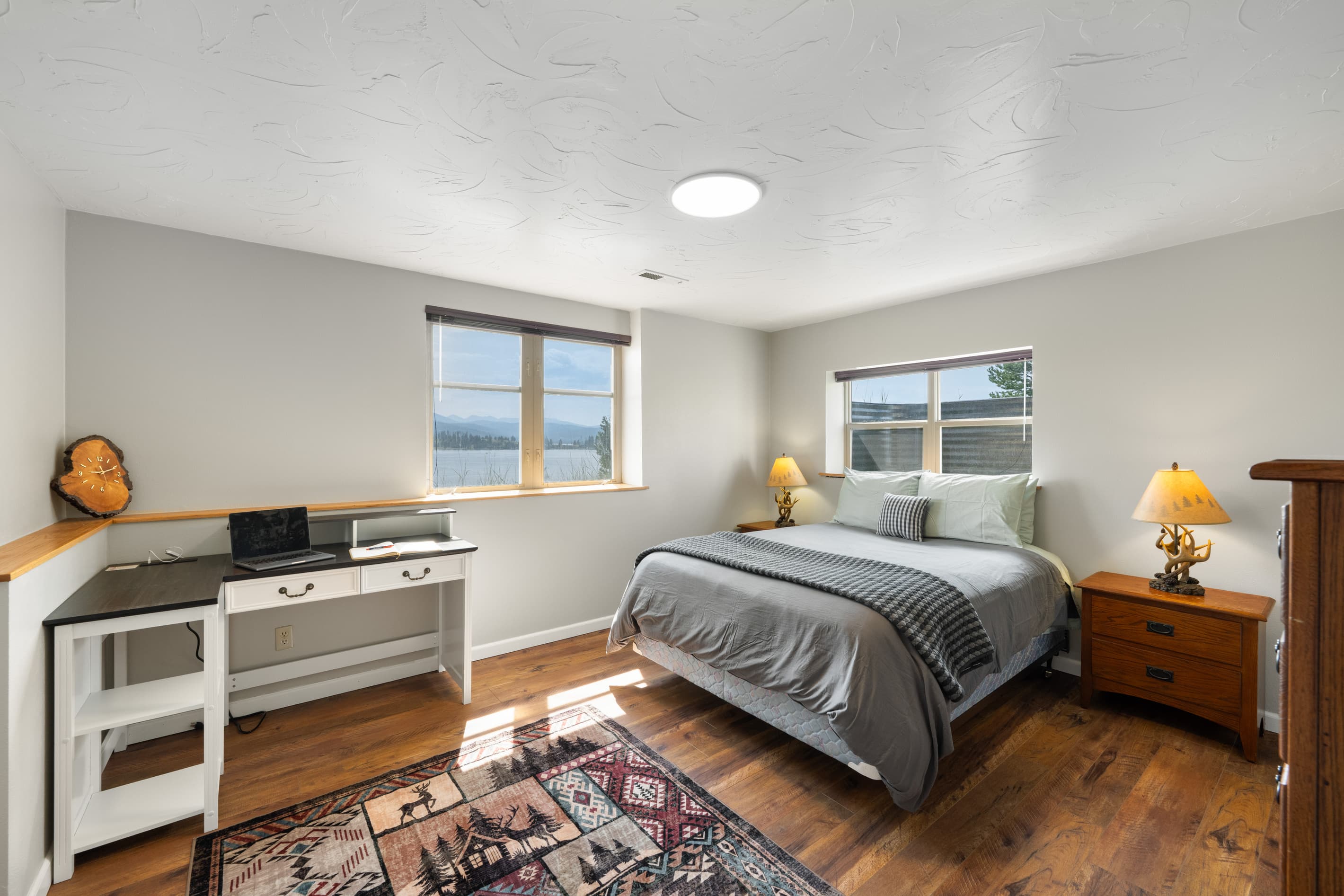 Bedroom 3: Lower guest bedroom with Queen bed & work space.