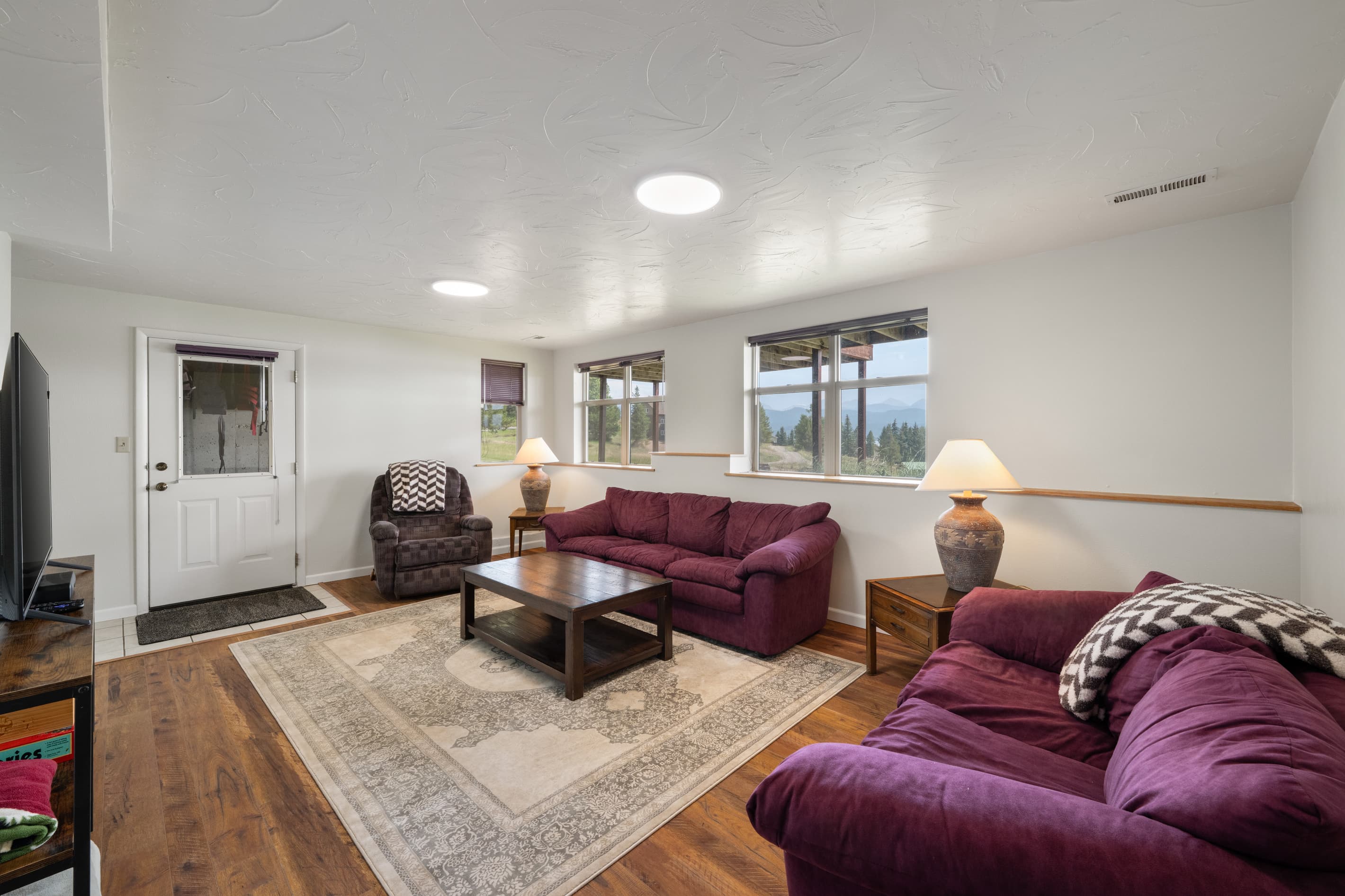 Lower Level TV room - with Roku TV, board games 