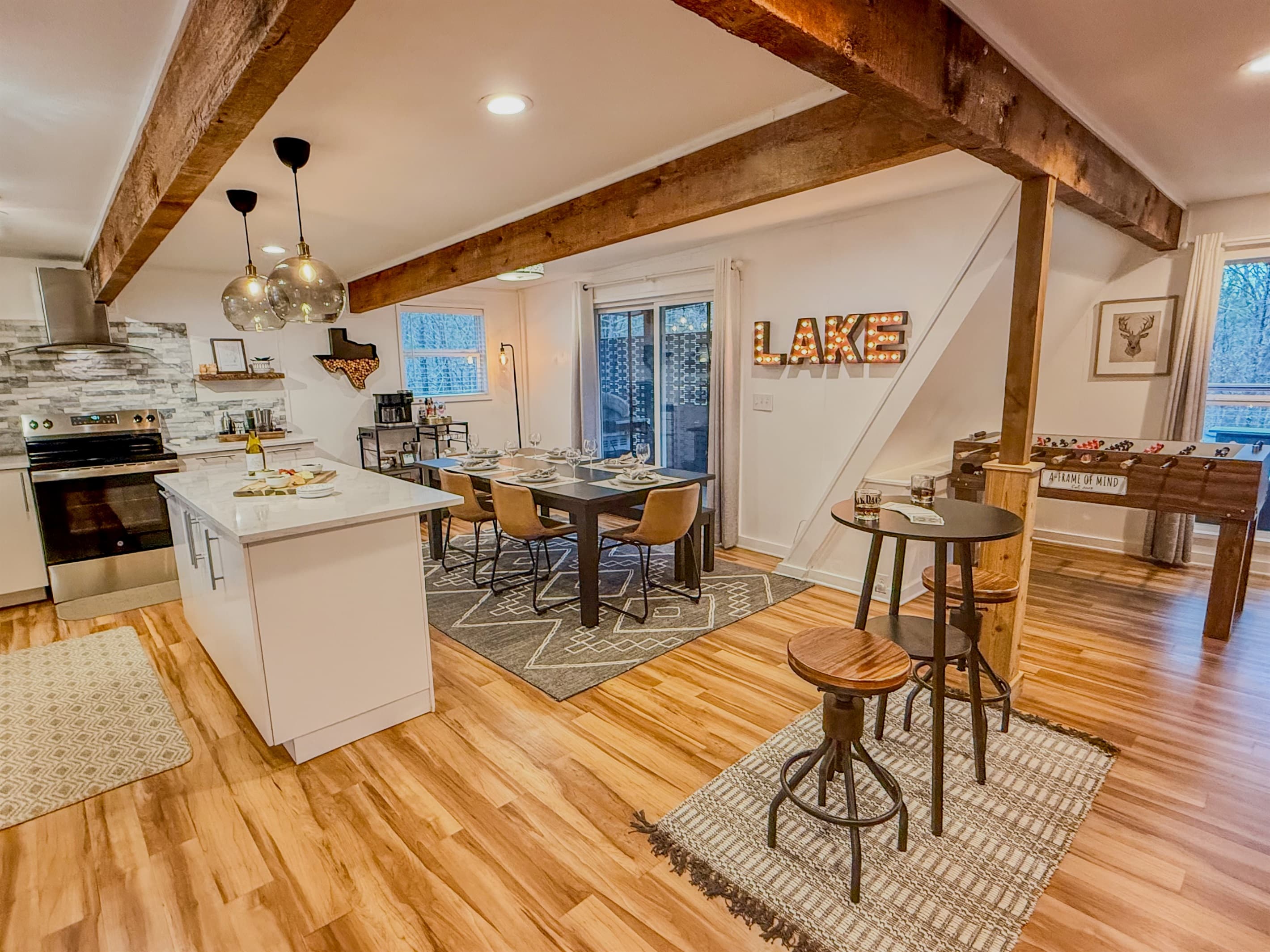 Open concept with seating for 6 people, Foosball table