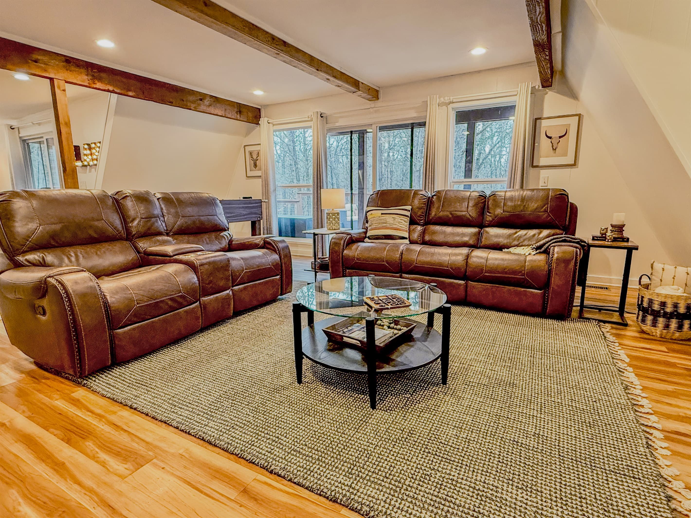 4 Recliners | Foosball Table | 75" Roku TV with Hulu Live TV | Books & Games | Gas Fireplace