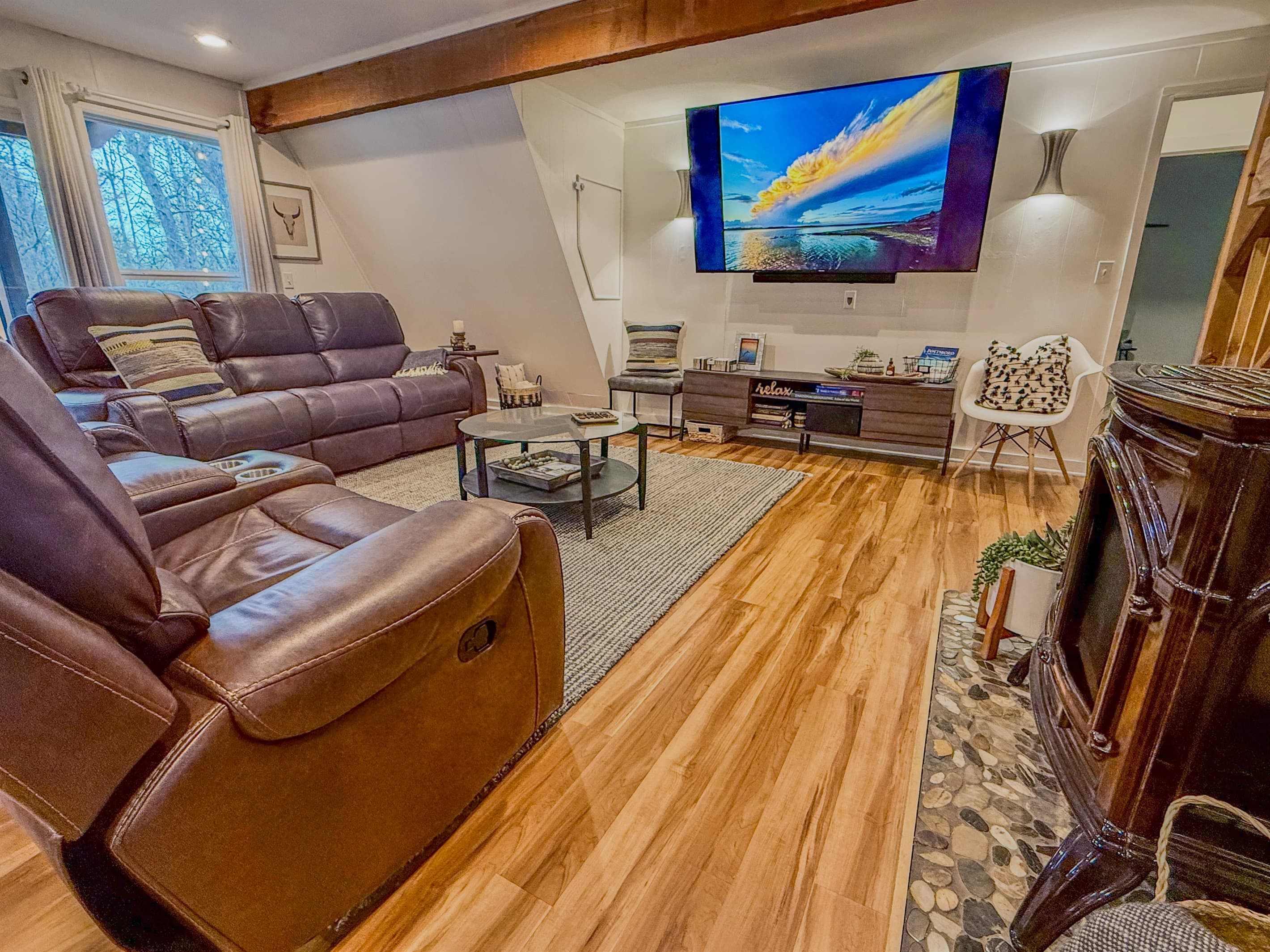 4 Recliners | Foosball Table | 75" Roku TV with Hulu Live TV | Books & Games | Gas Fireplace