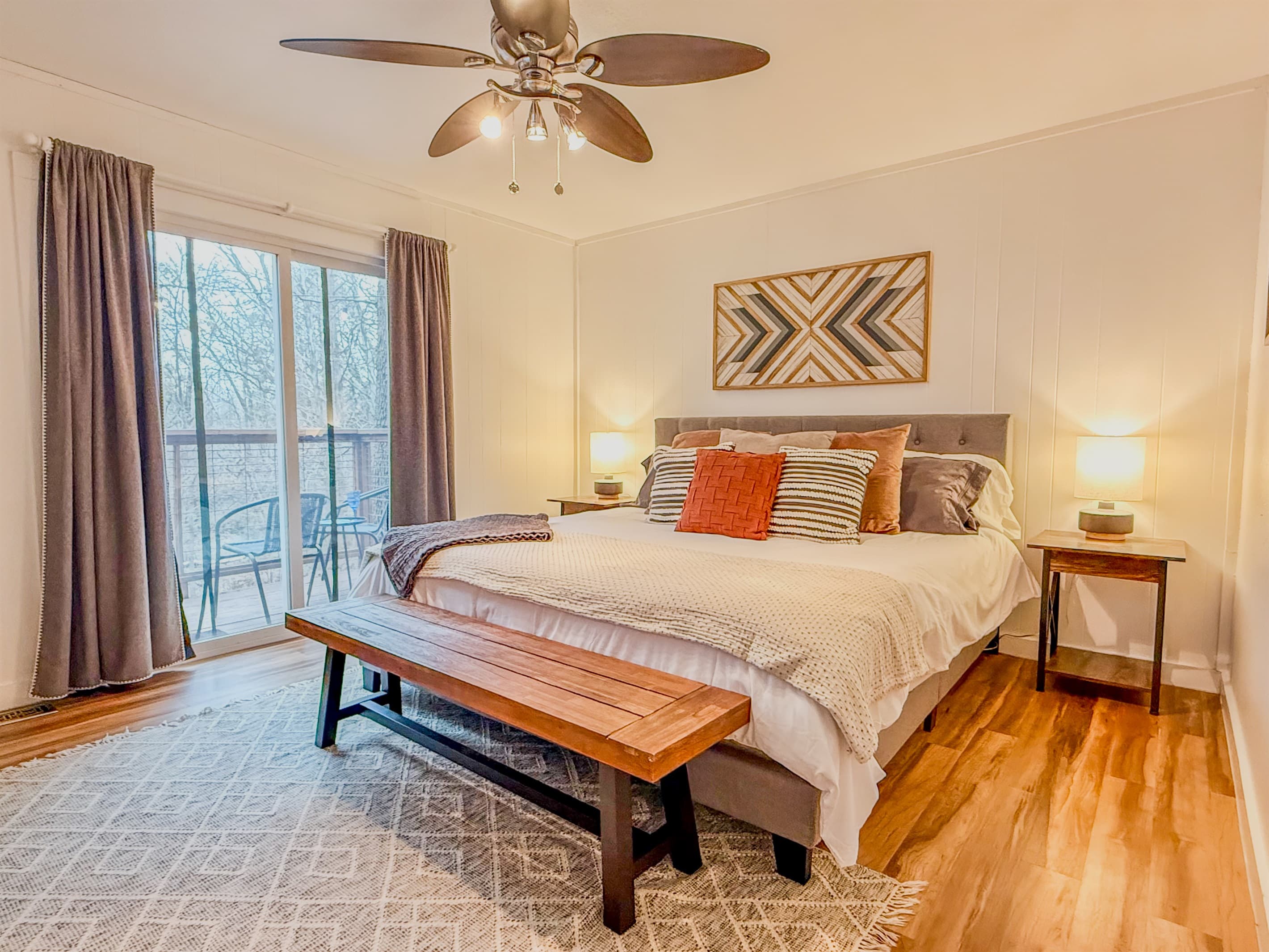 Primary Bedroom | King bed | Deck Access | 65" Roku TV with Hulu Live TV | Ceiling Fan