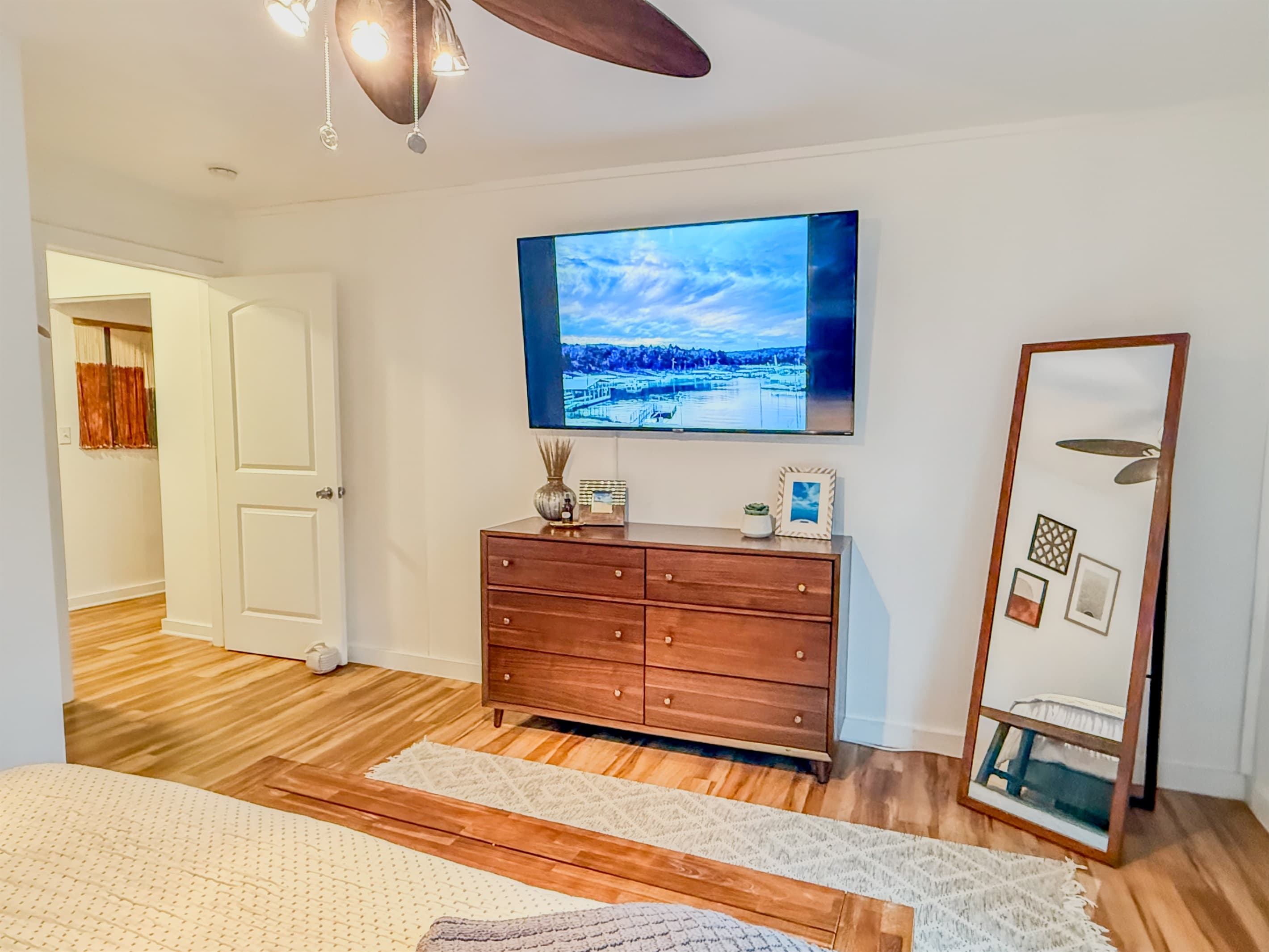 Primary Bedroom | 65" Roku TV with Hulu Live TV | Ceiling Fan | Dresser Available for Guests