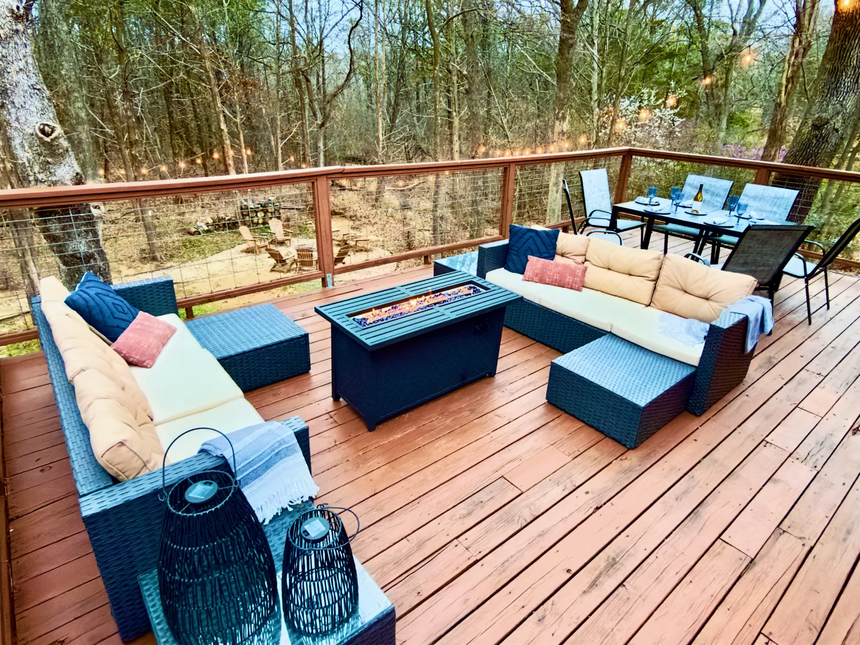 800 sf Deck | Fire Table | Outdoor Cooler | Gas Grill (Propane Provided) | Private Hot Tub | Outdoor Games | Private Wooded Views | String Lights | Outdoor Dining Table for 6