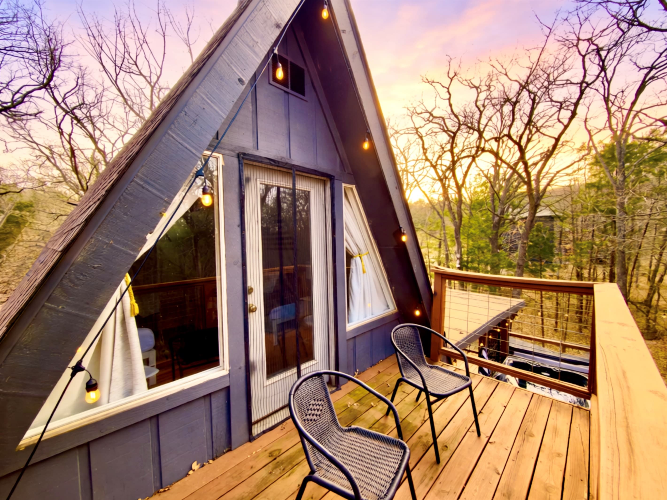 Balcony off Upstairs Bedroom Overlooking the Deck, Fire Pit, and Woods