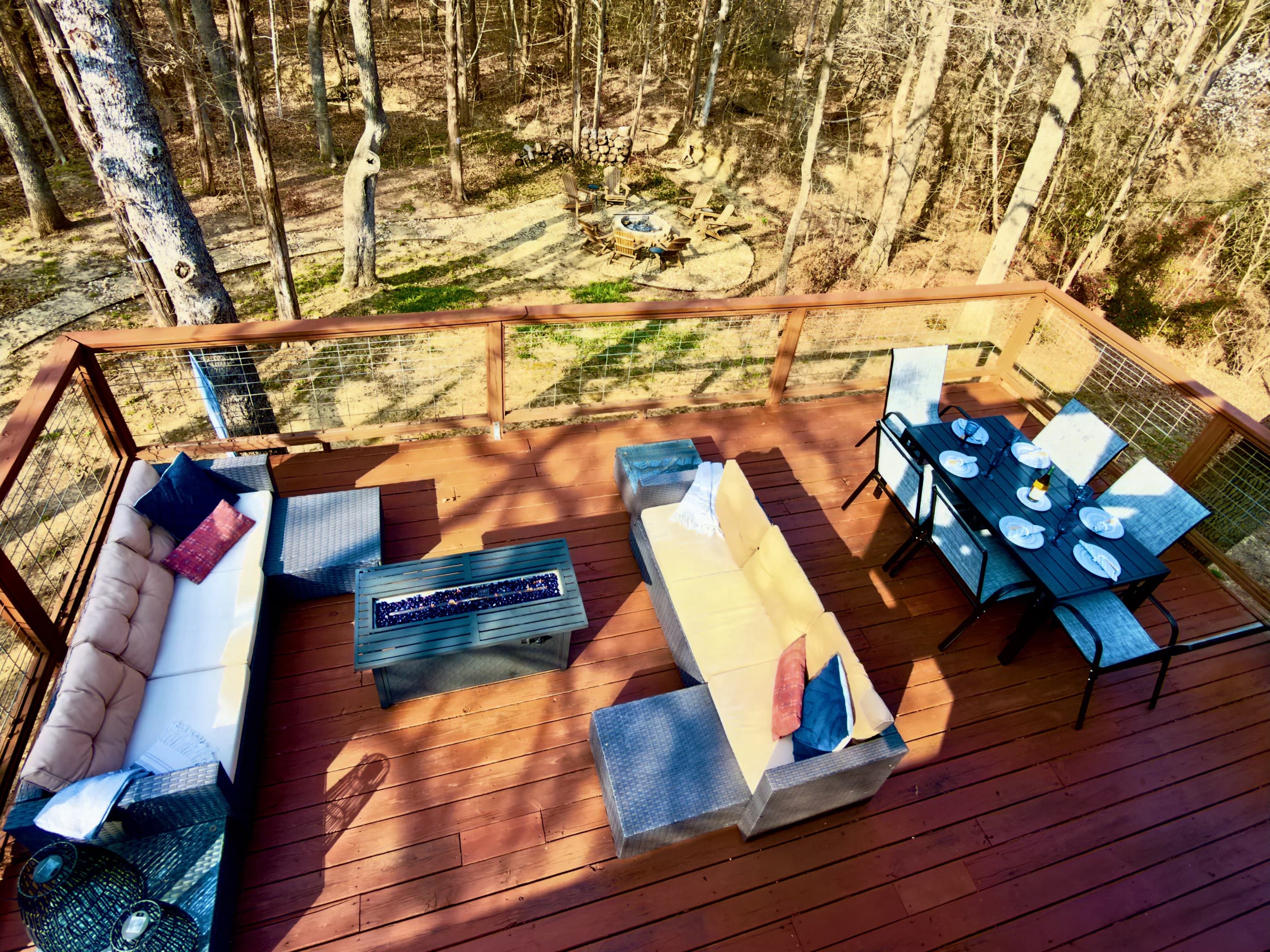 Overlooking the Deck, Fire Pit, and Woods from the Upstairs Bedroom 
