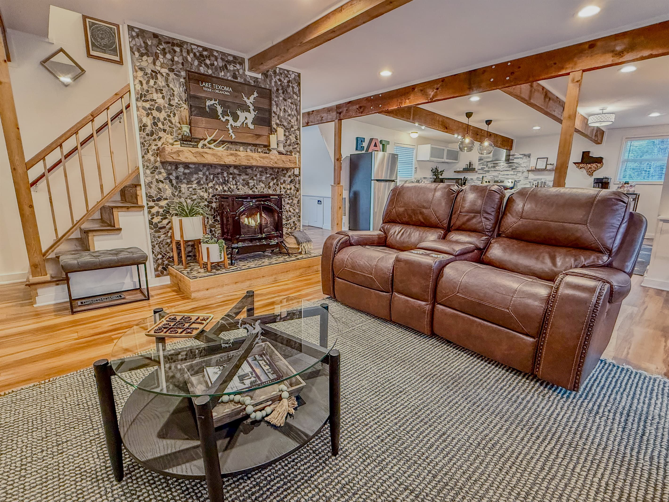 4 Recliners | Foosball Table | 75" Roku TV with Hulu Live TV | Books & Games | Gas Fireplace