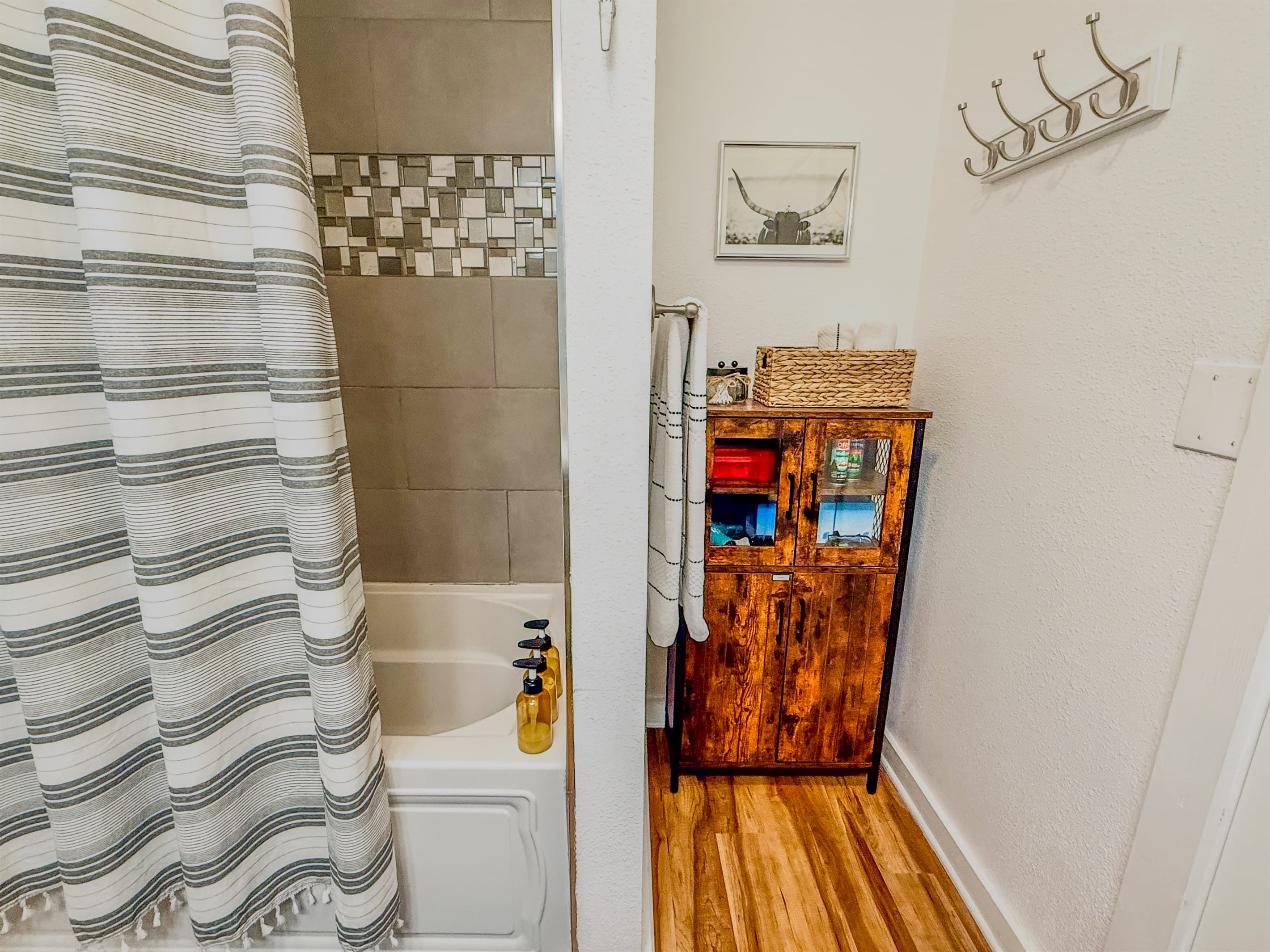 Main Bathroom | Shower & Bathtub | Ginger Lily Farms Botanicals Shampoo, Conditioner, Body Wash, Hand Soap & Lotion Provided