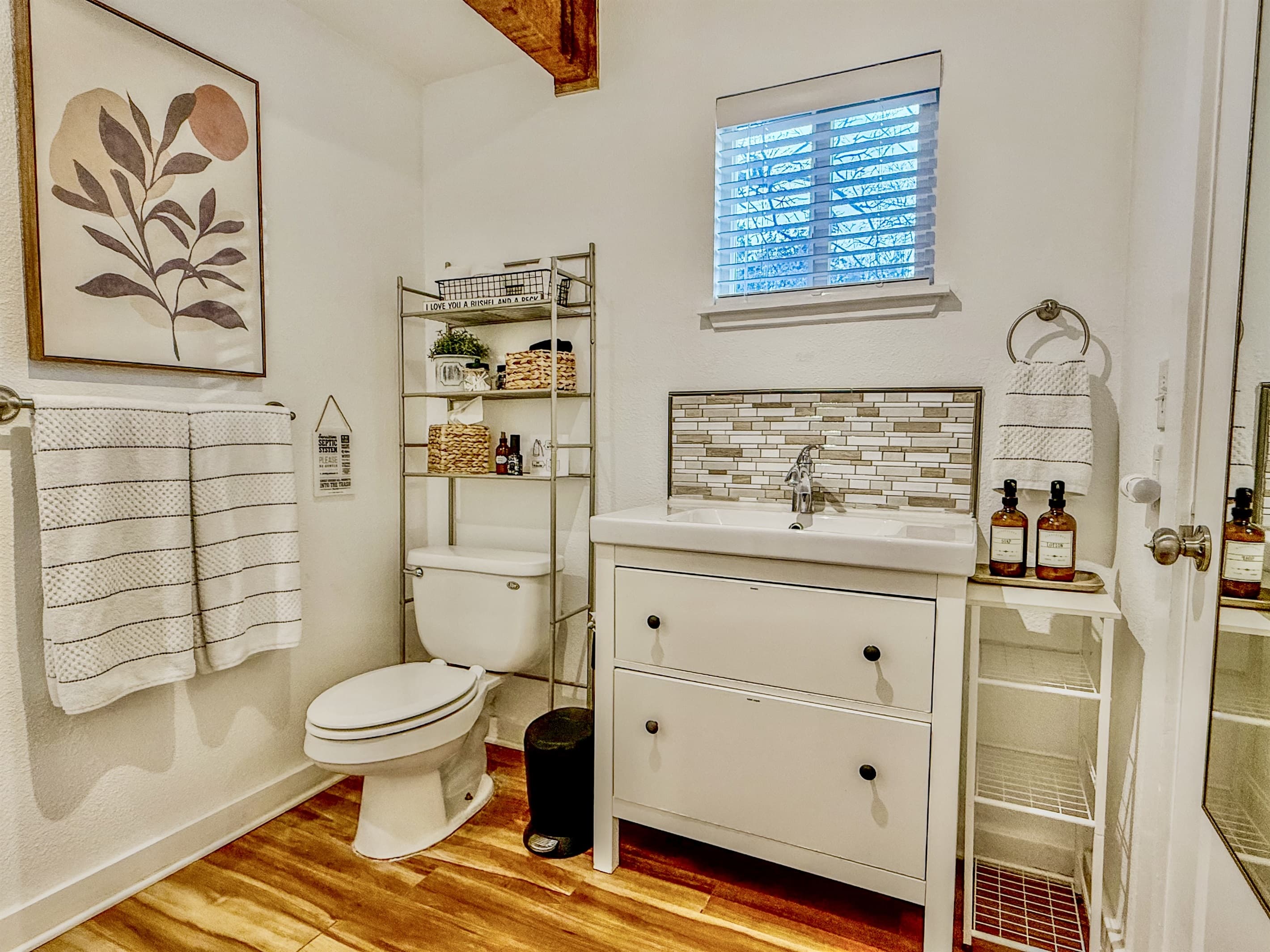 Front Bathroom | Ginger Lily Farms Botanicals Shampoo, Conditioner, Body Wash, Hand Soap & Lotion Provided