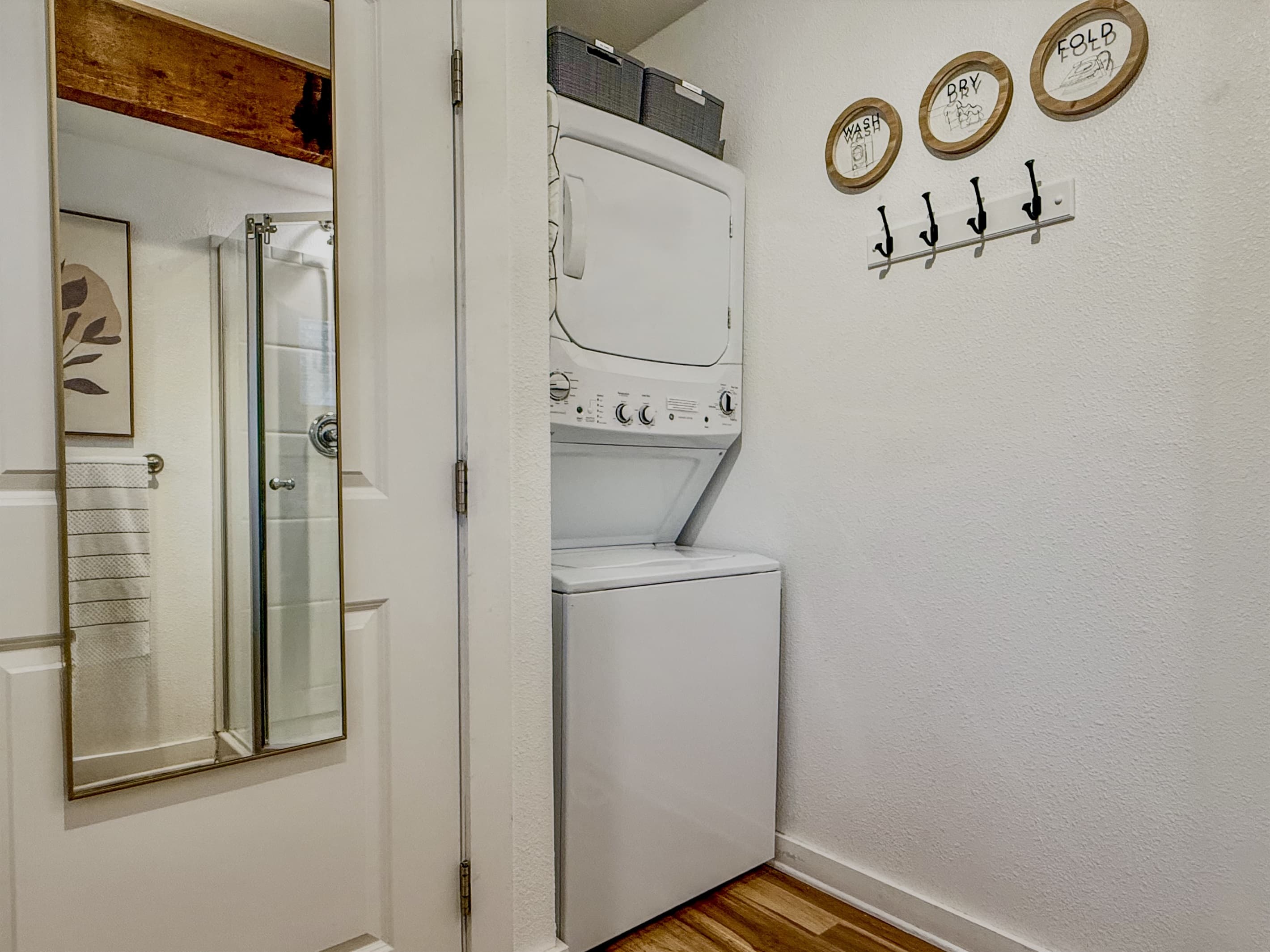 Front Bathroom | Washer & Dryer | A Few Laundry Pods Provided | Iron & Ironing Board