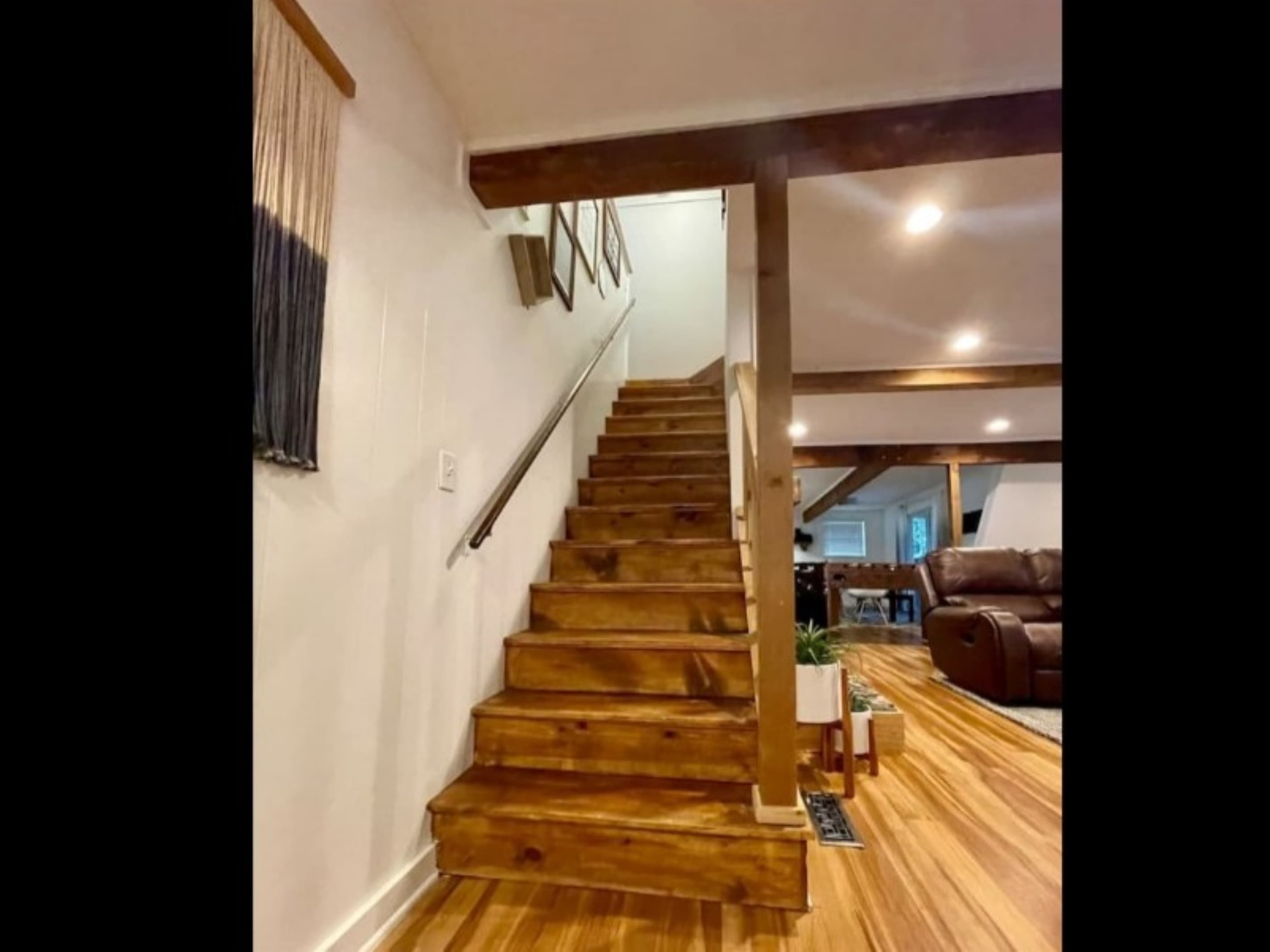 Stairs to the upstairs bedroom and office/game room