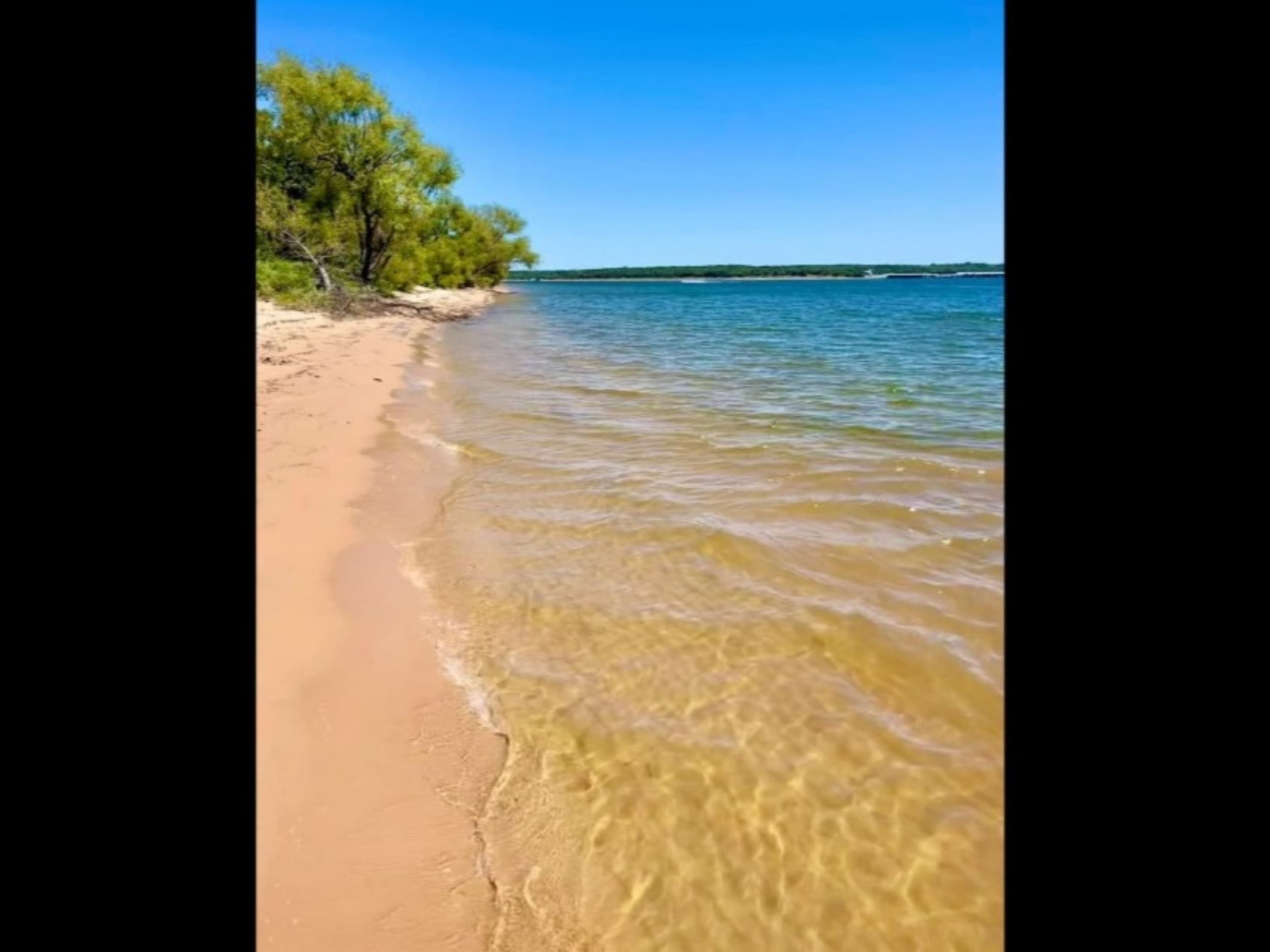 Enjoy the Island's Sandy Beaches at Lake Texoma - accessible only by boat | *Lake water clarity and levels fluctuate throughout the year.
