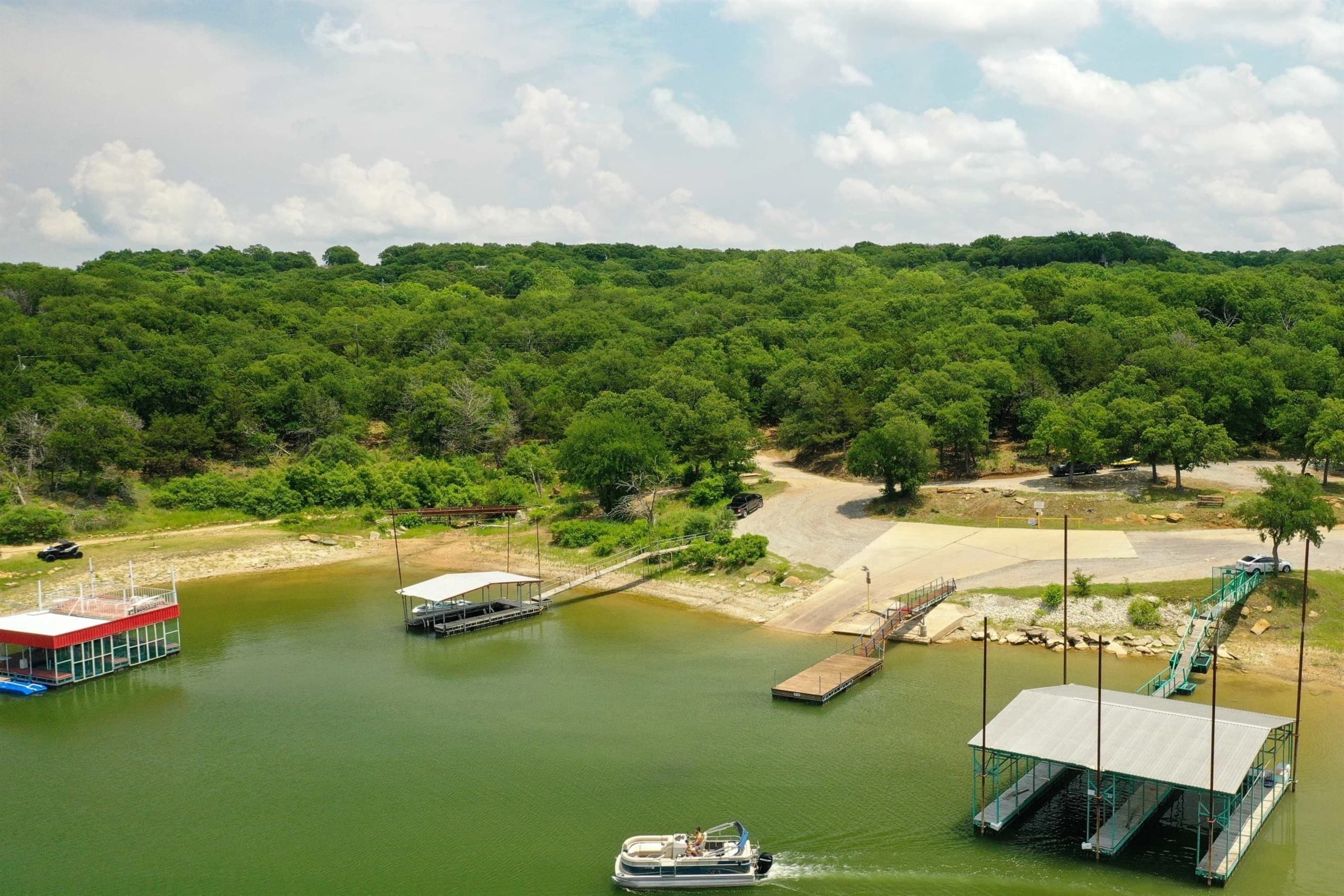 Neighborhood Lake Access & Boat Ramp - 0.3 mile | *Lake water clarity and levels fluctuate throughout the year, which affects the appearance of the shoreline.
