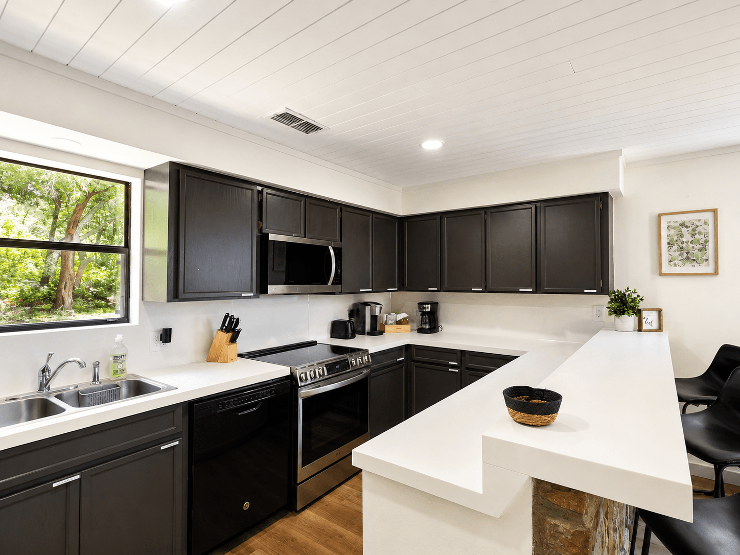 Full kitchen with ample counter space and storage.