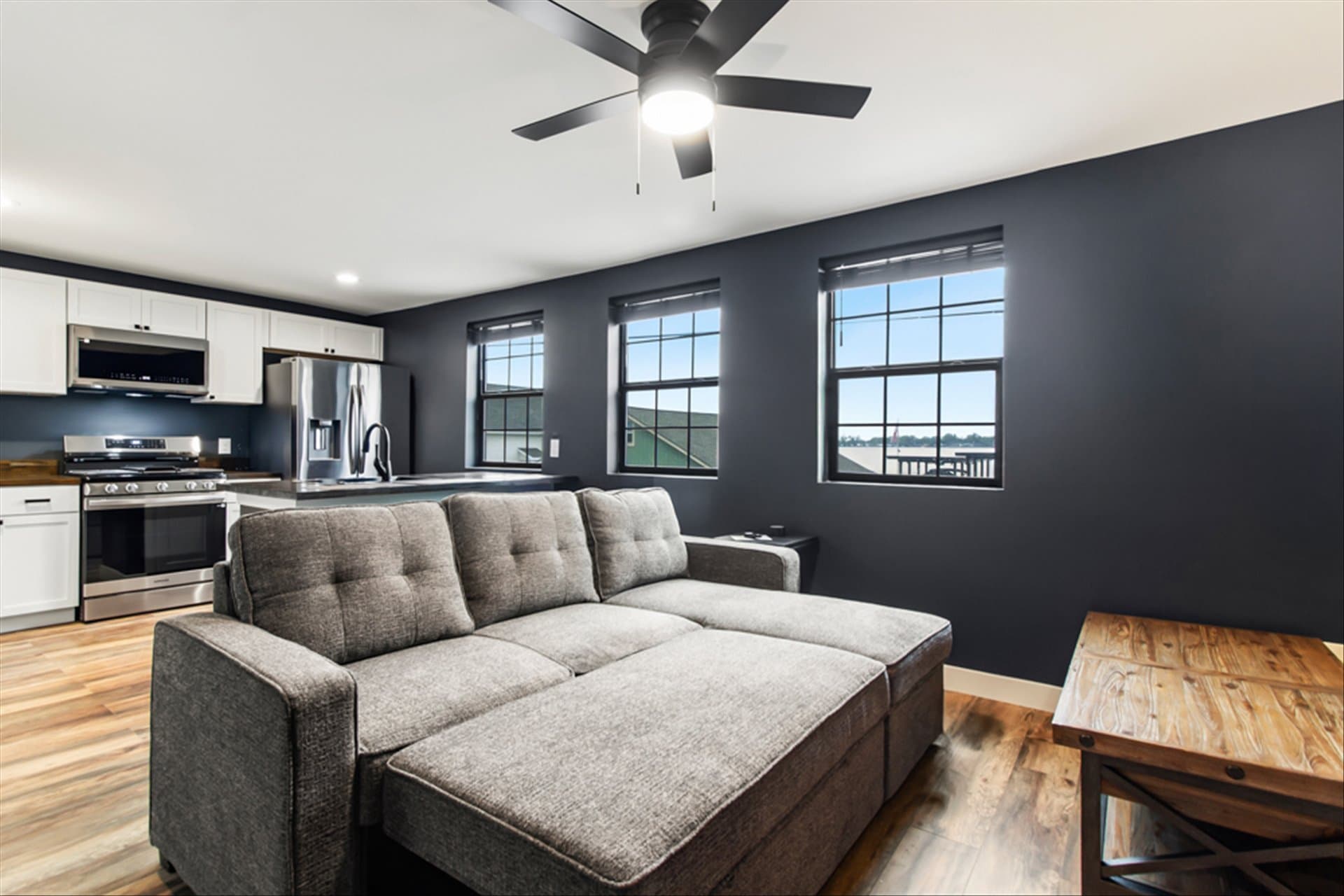 The Loft on Waterbury - Couch expands as a bed.